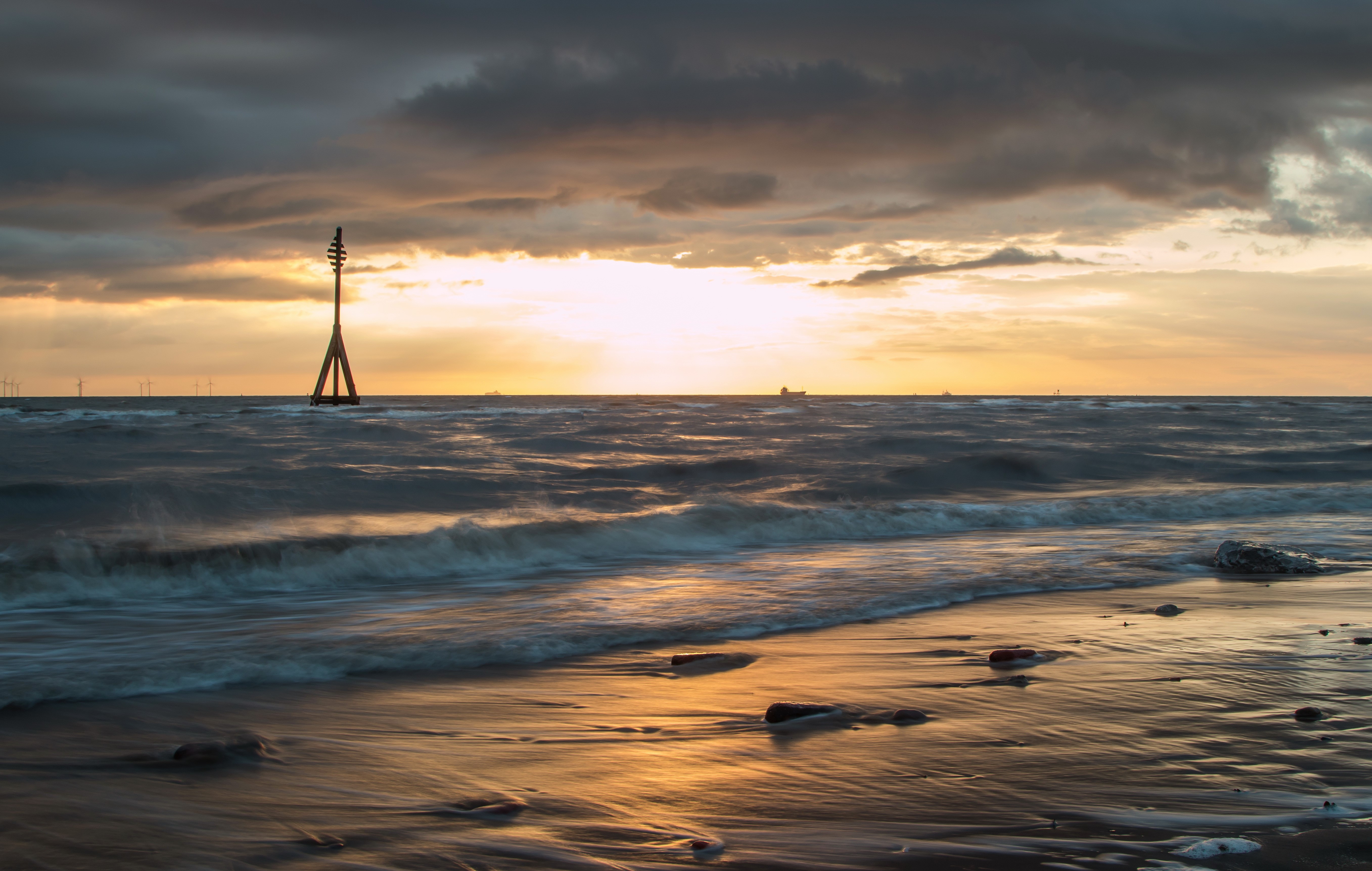 Sunset over the sea with a marker buoy HD Wallpaper