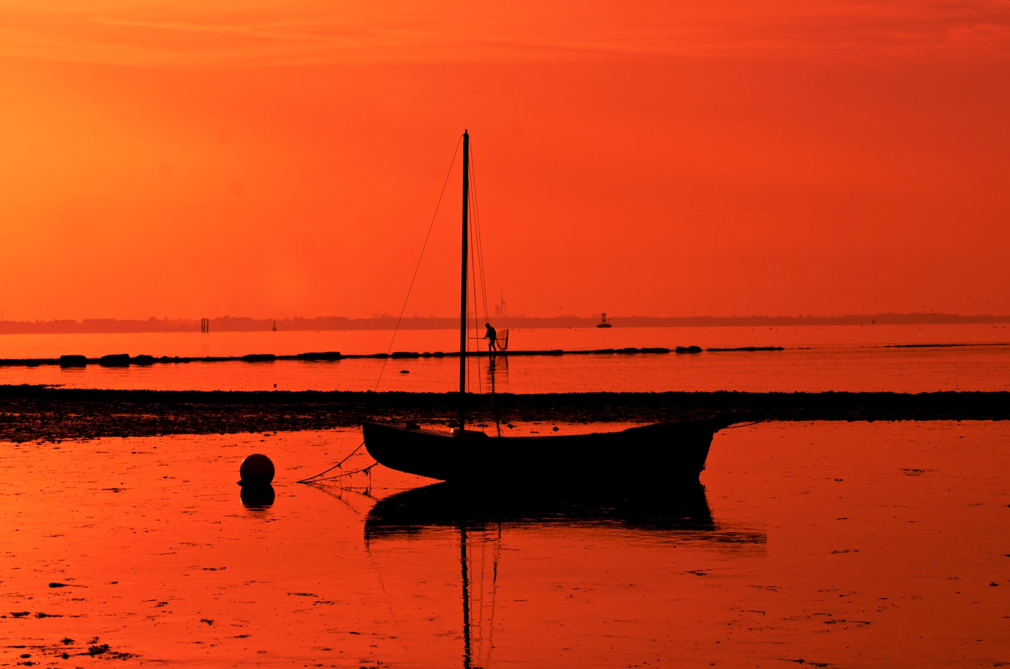 Silhouette of a sailboat at sunset HD Wallpaper