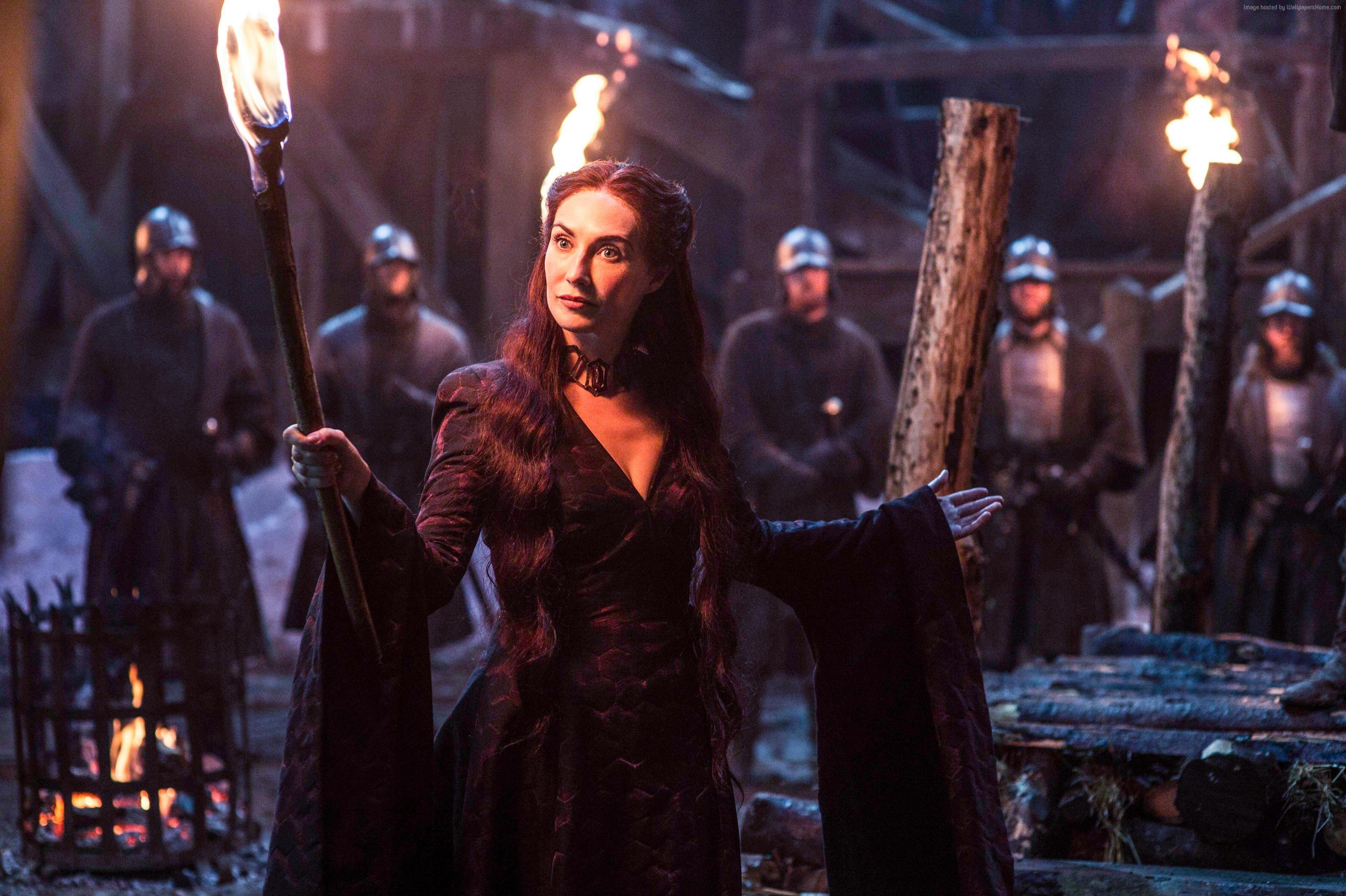 Melisandre from Game of Thrones holding a torch HD Wallpaper