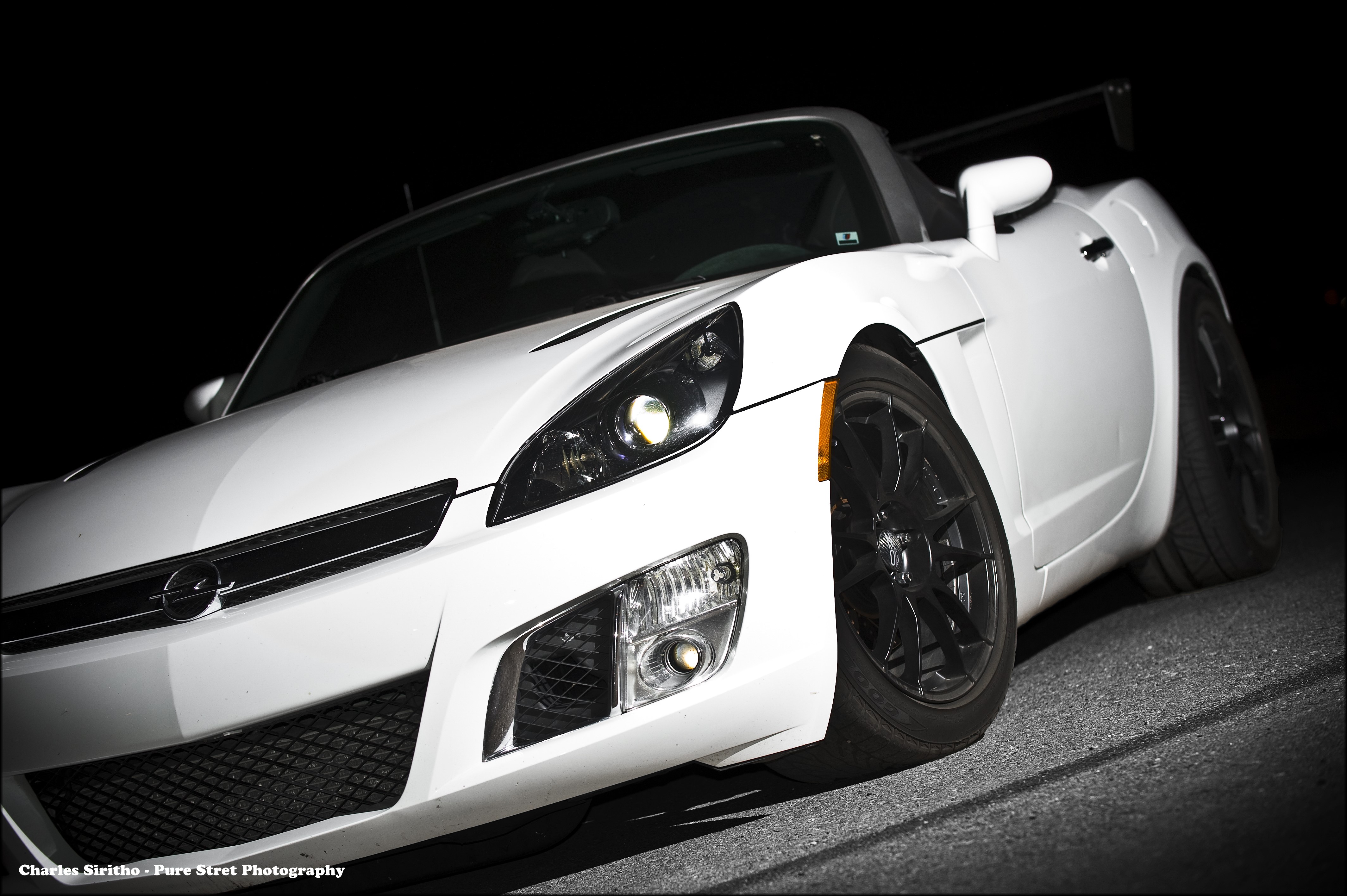 White Opel Cabriolet with Black Wheels HD Wallpaper