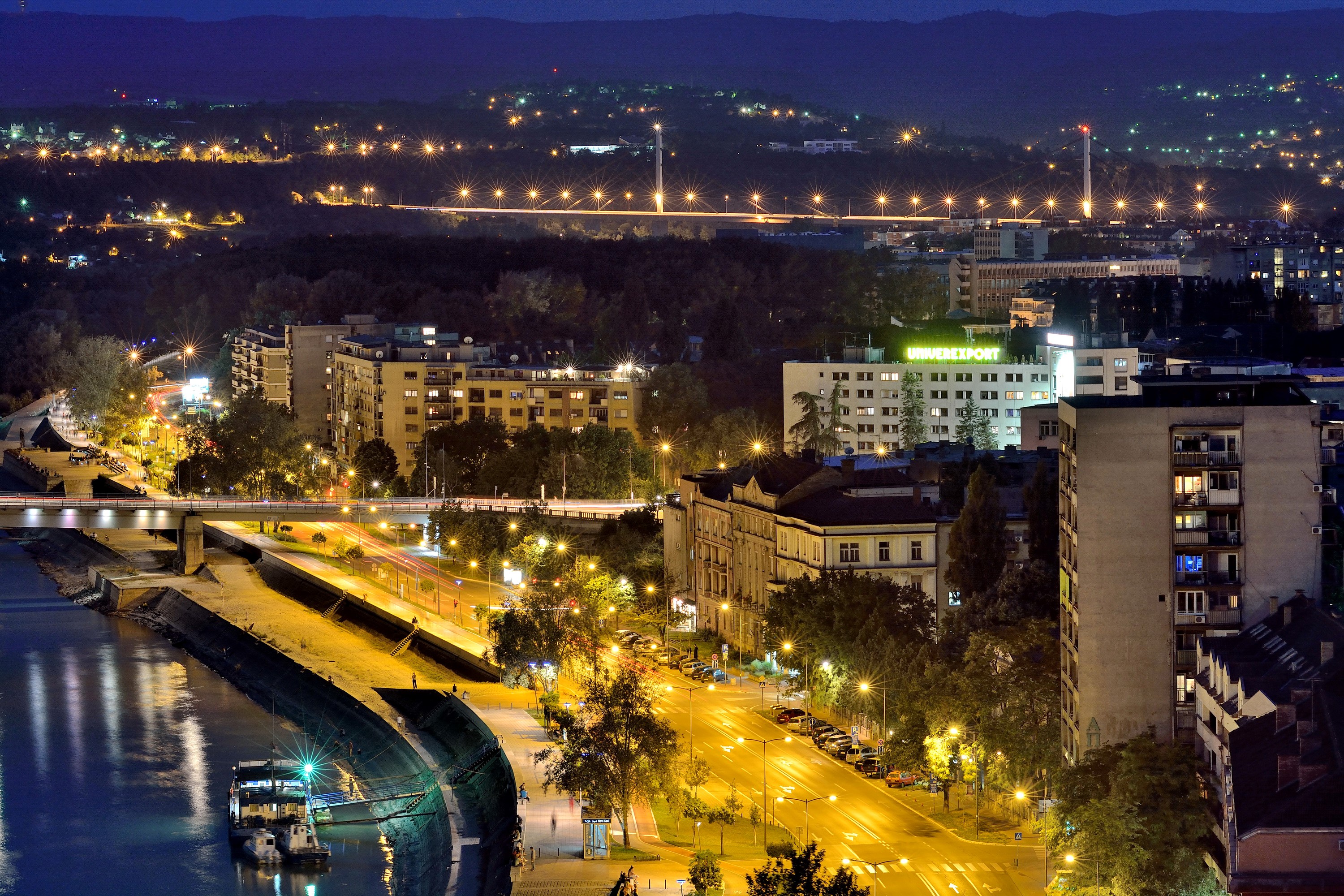 Novi Sad at night with bridge and river HD Wallpaper