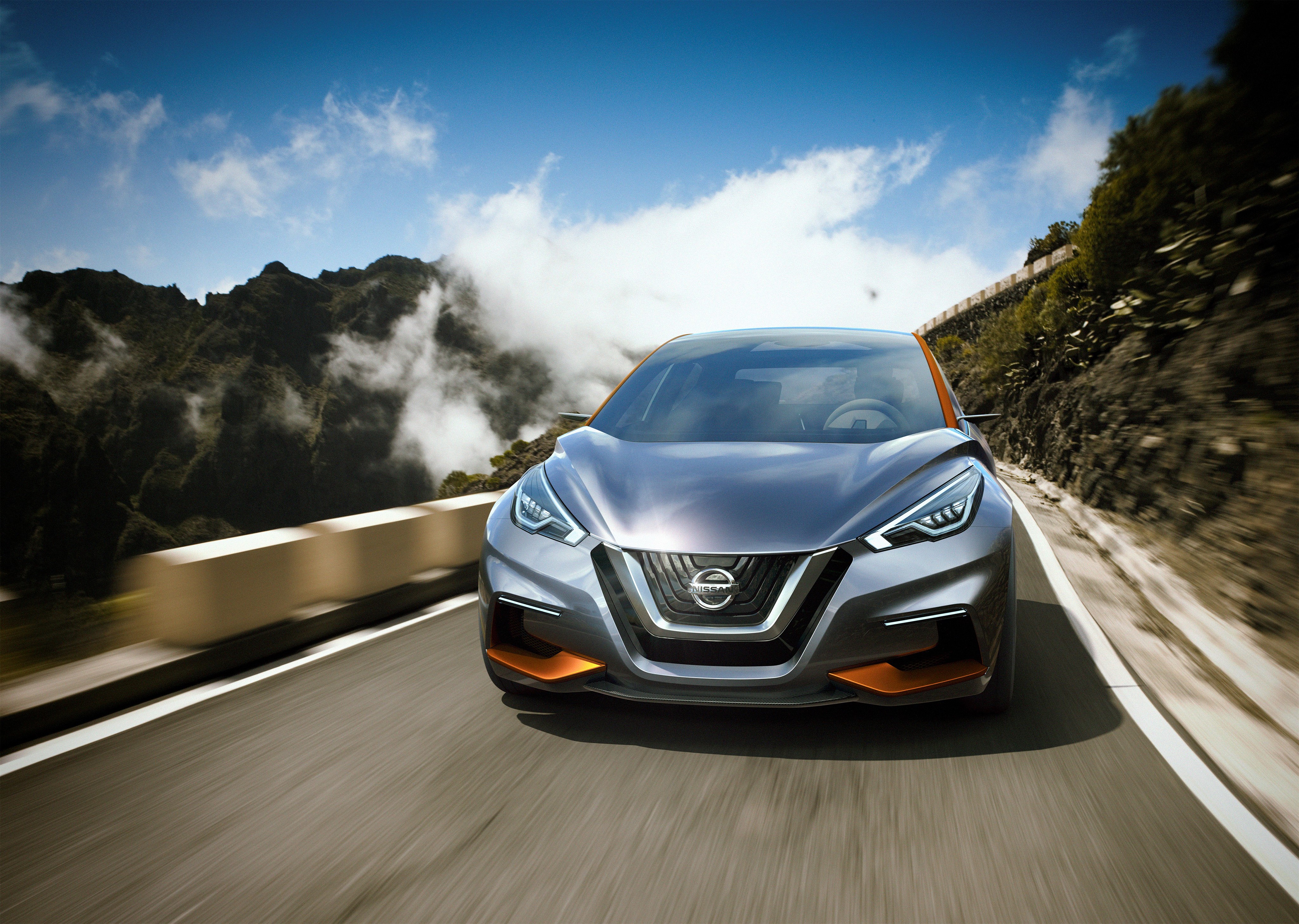 Nissan Sway Concept car driving on a mountain road HD Wallpaper