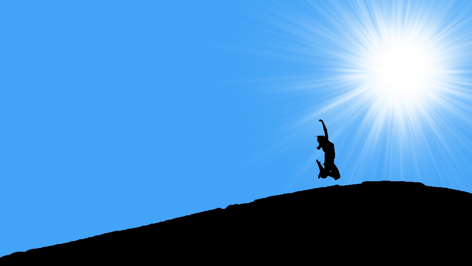 Silhouette of a person jumping on a hill under the sun HD Wallpaper