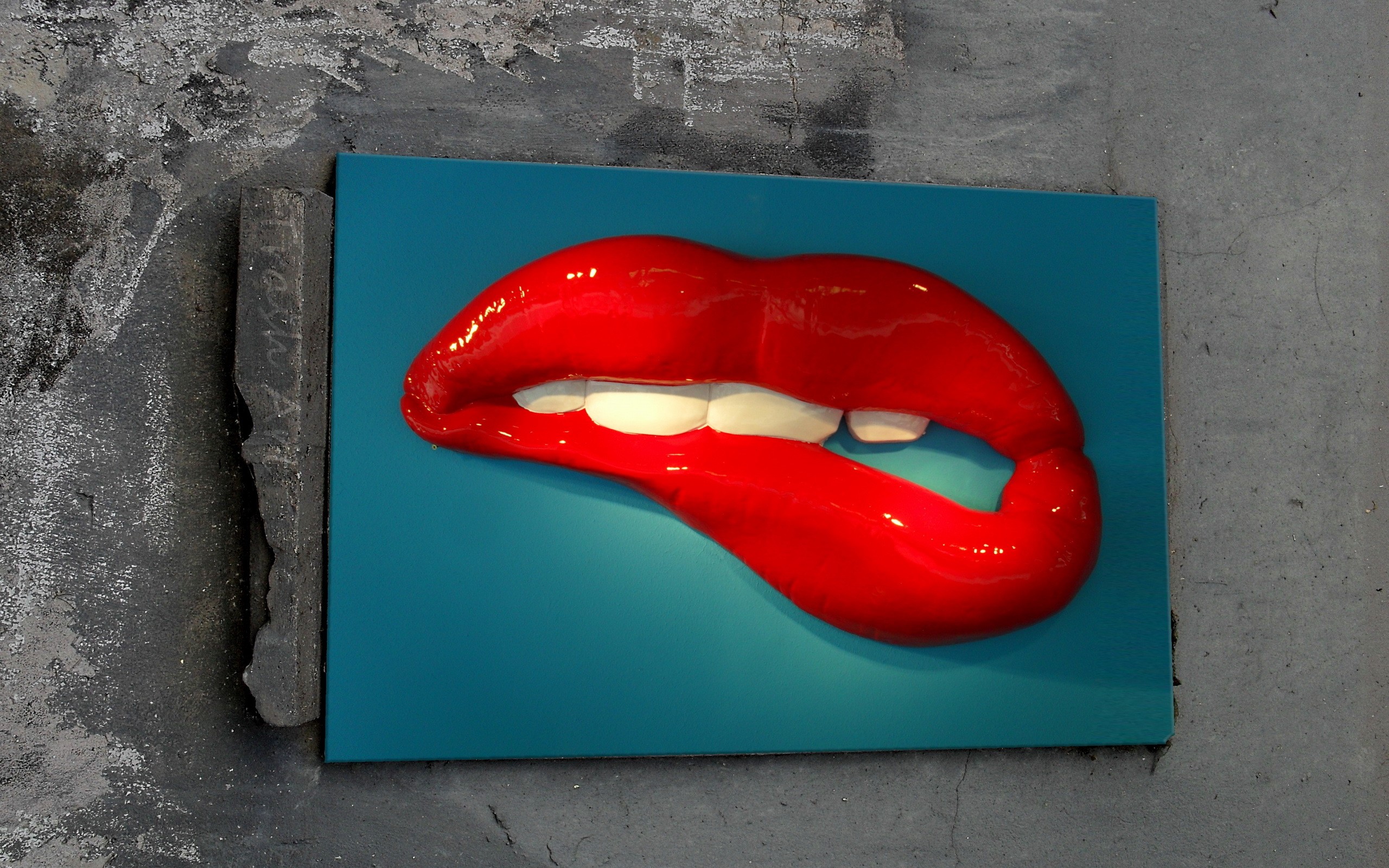 Red lips biting on a teal background HD Wallpaper
