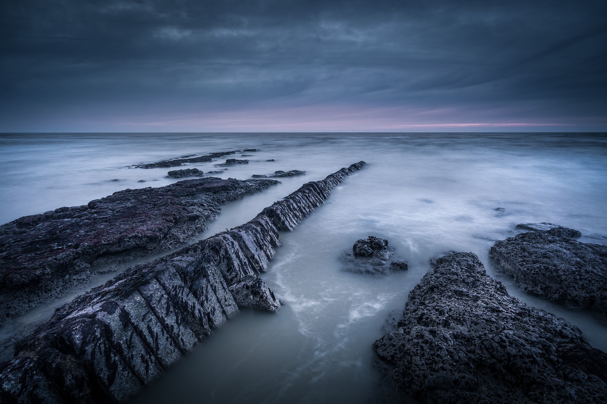 Rocky Coastline in Suffolk, United Kingdom at Dusk HD Wallpaper