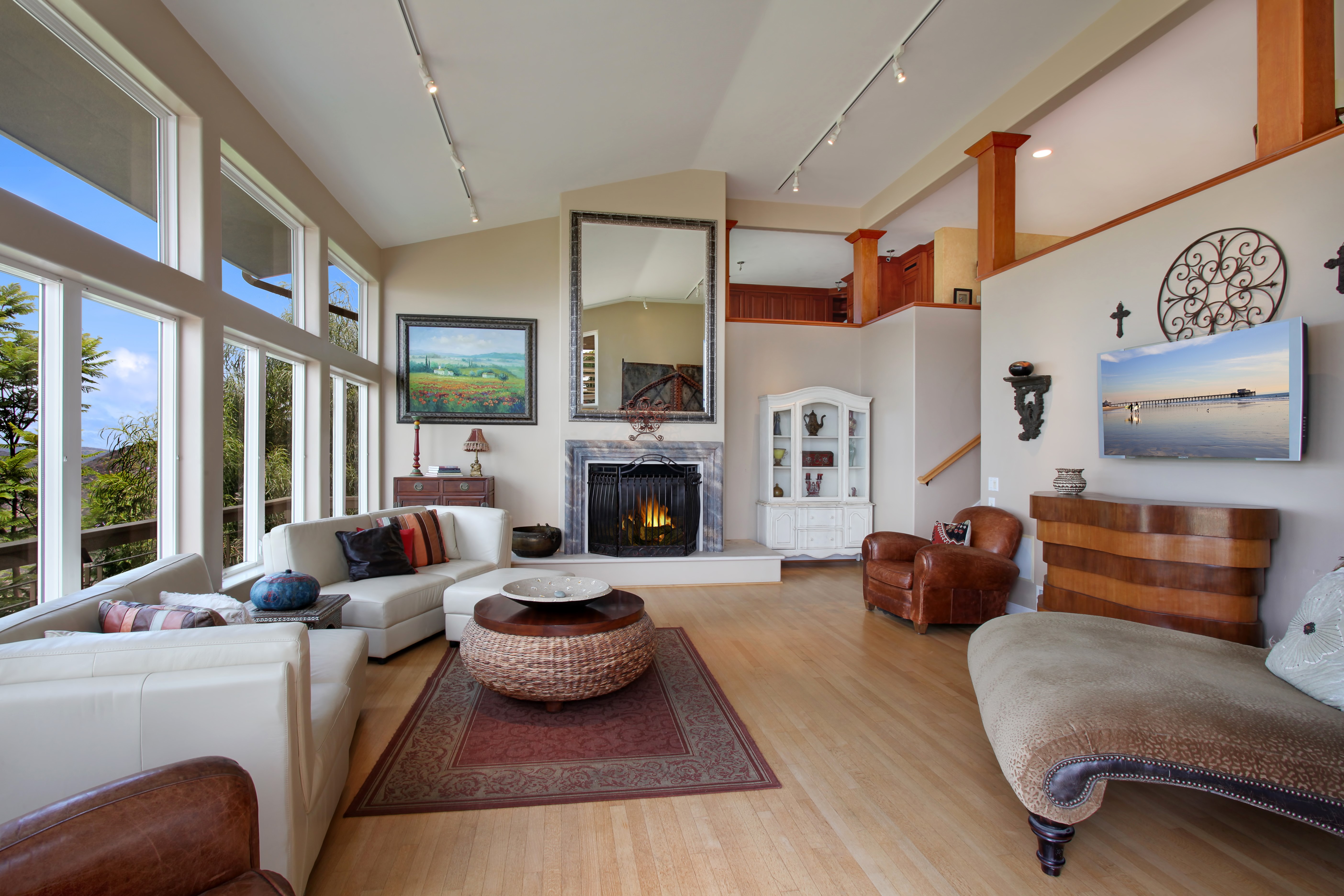 Living room with sofa and fireplace HD Wallpaper