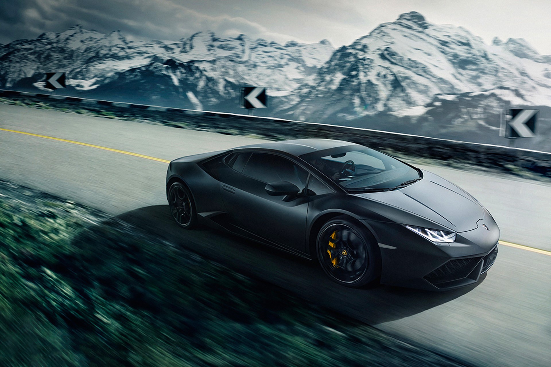 Black Lamborghini Huracan LP640-4 driving on a mountain road HD Wallpaper