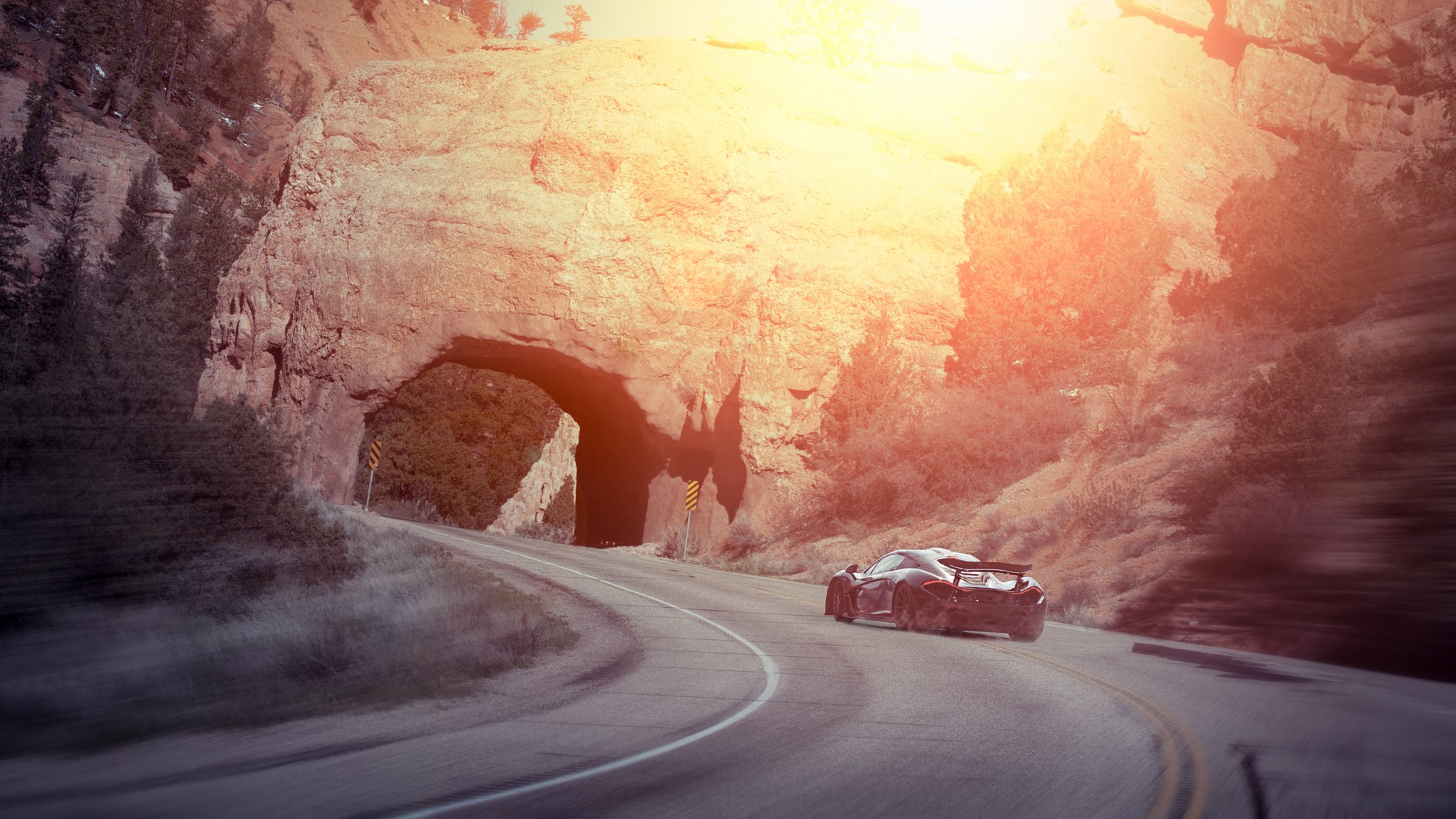 McLaren P1 Supercar Drifting Through Rock Arch Tunnel HD Wallpaper