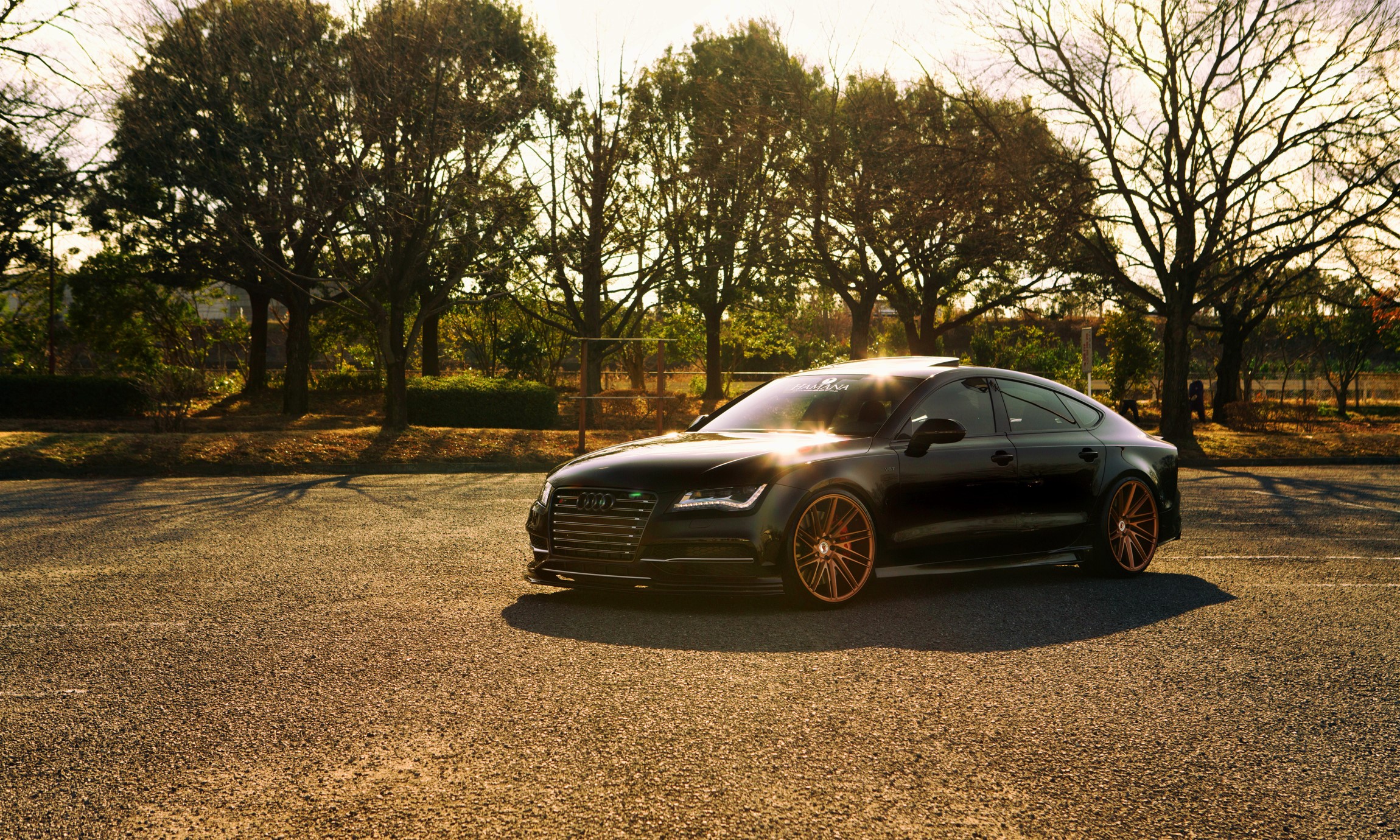 Black Audi A7 parked on asphalt road HD Wallpaper