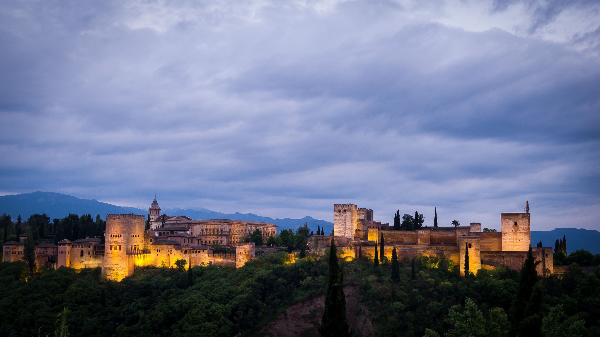 The Alhambra palace complex in Granada, Spain at dusk HD Wallpaper