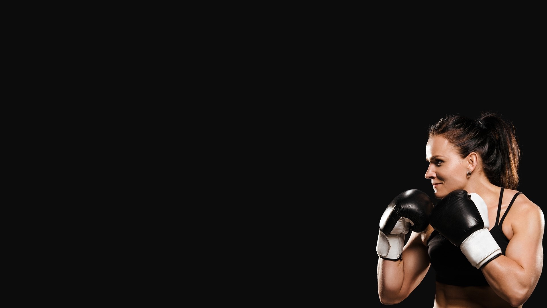 Woman boxer in guard pose HD Wallpaper