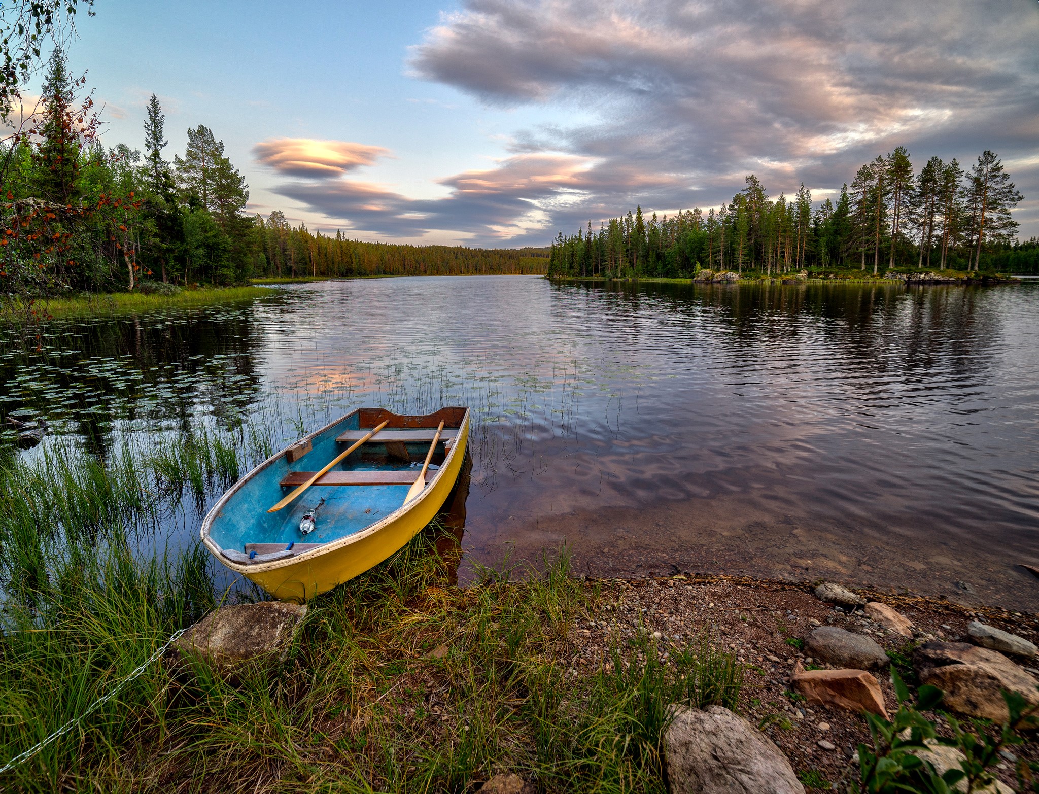 Yellow and blue rowboat on a lake in Norway HD Wallpaper
