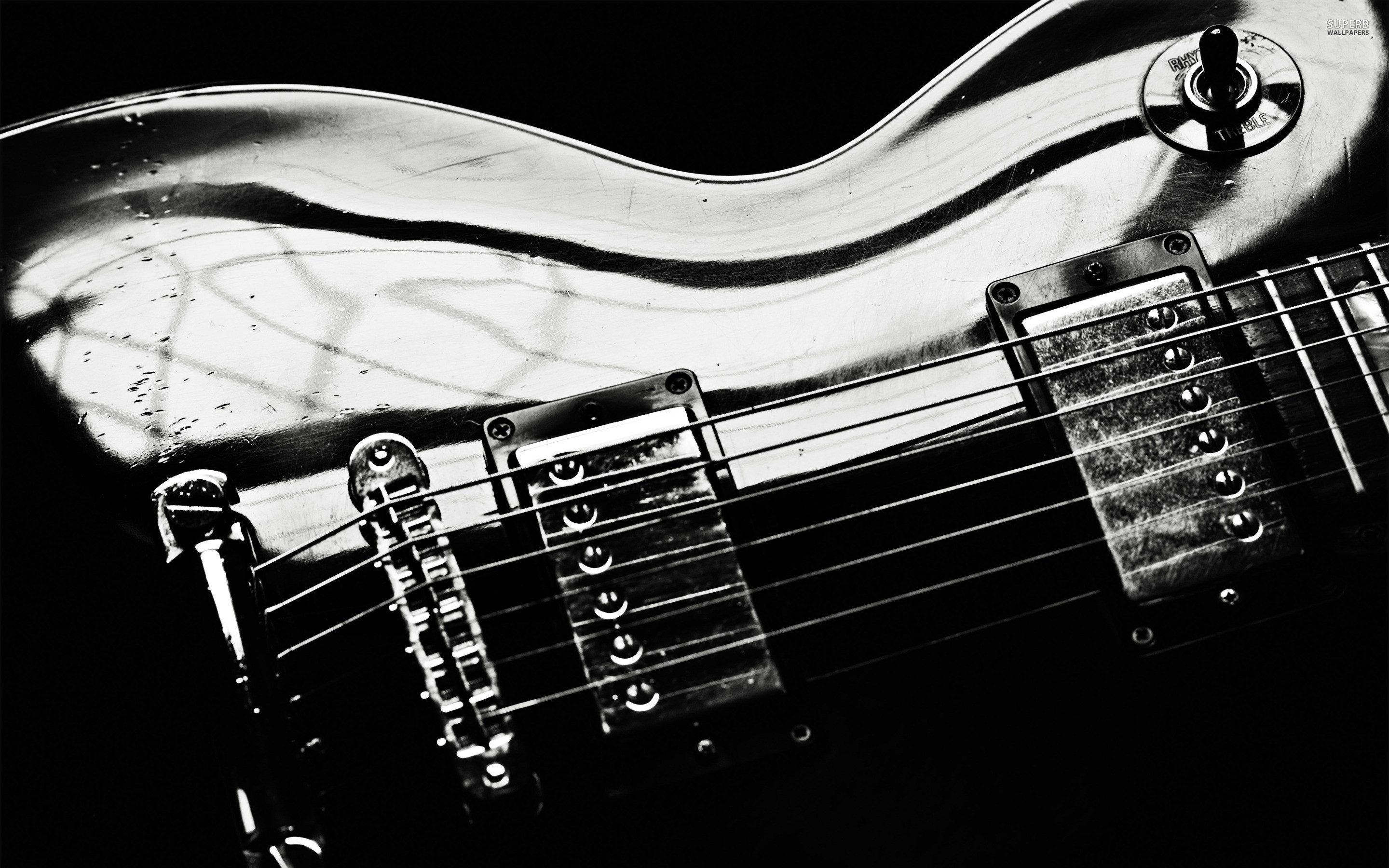 Closeup of a shiny electric guitar HD Wallpaper