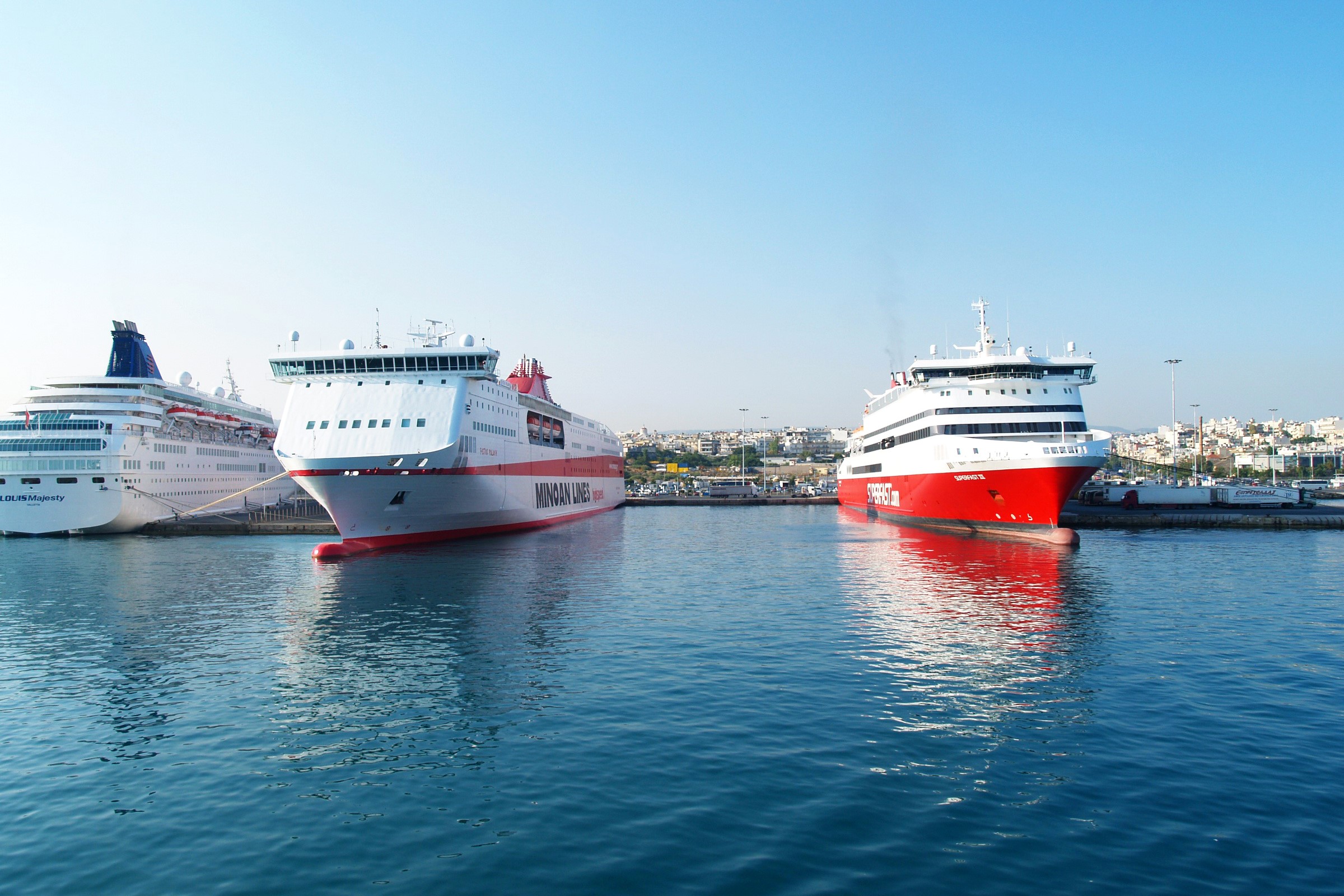 Ferries and Cruise Ship in a Harbor HD Wallpaper