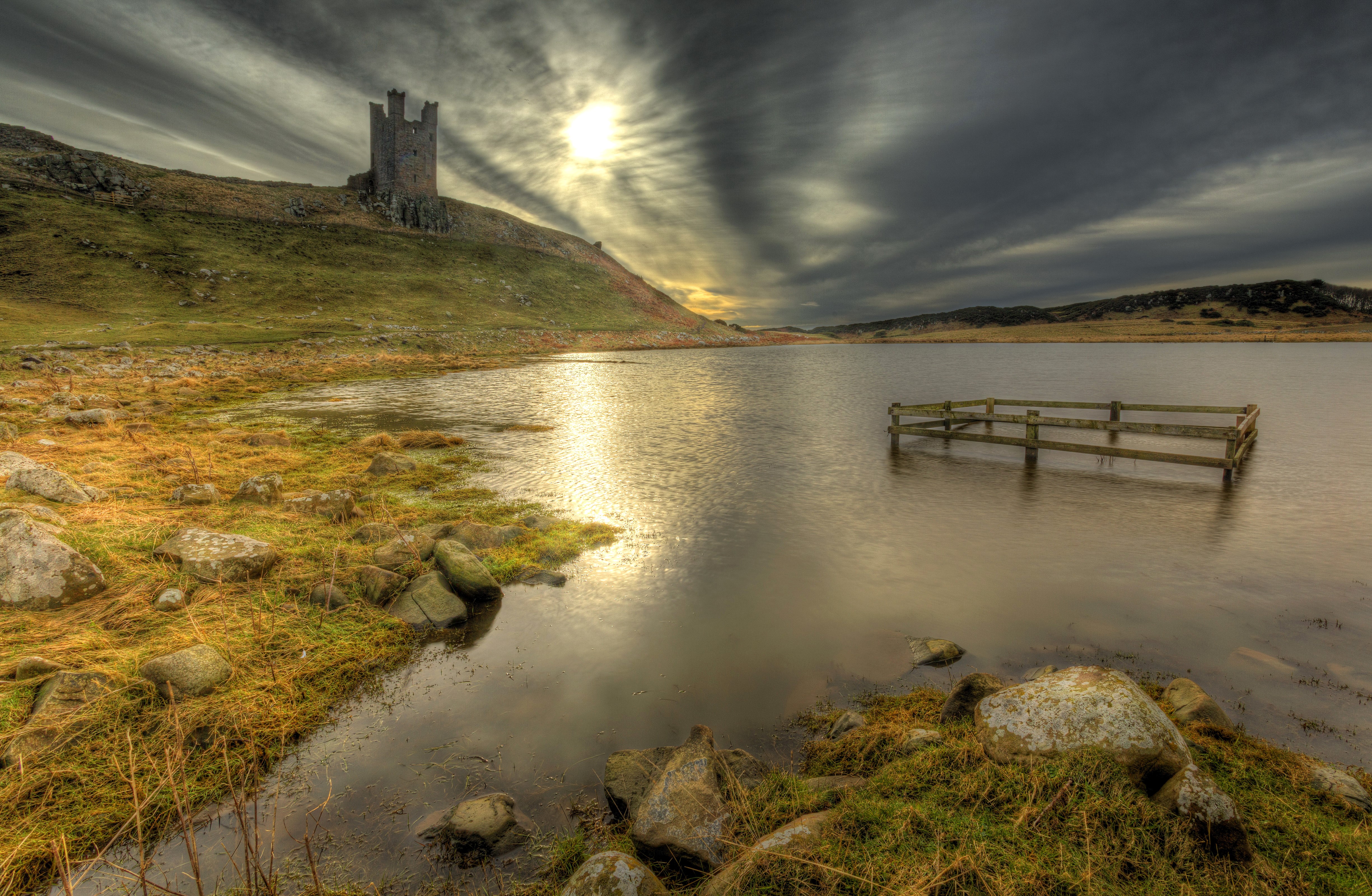 4K Dunstanburgh Castle Scenery with River and Sky HD Wallpaper