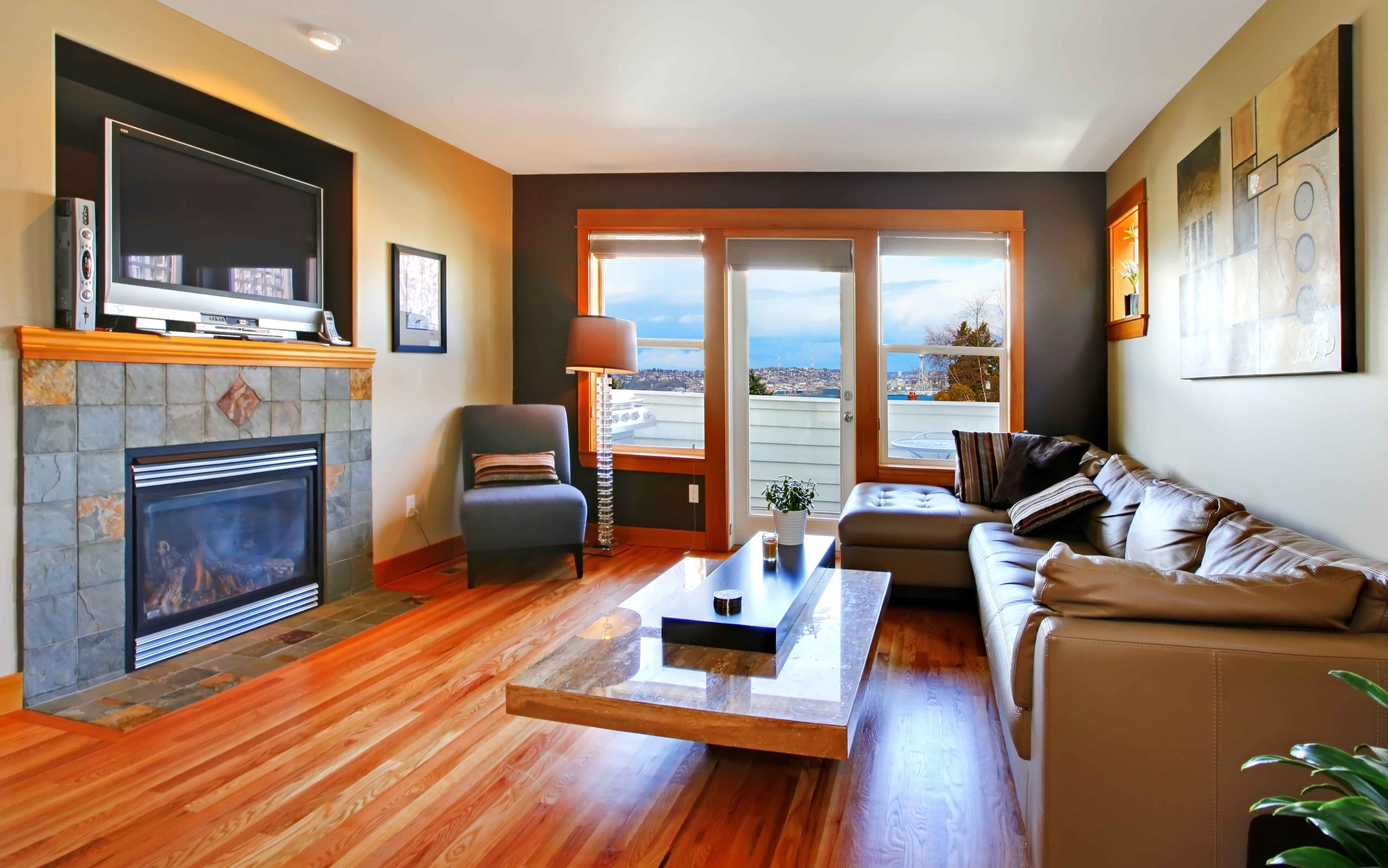 Living room with fireplace, sofa, and coffee table HD Wallpaper