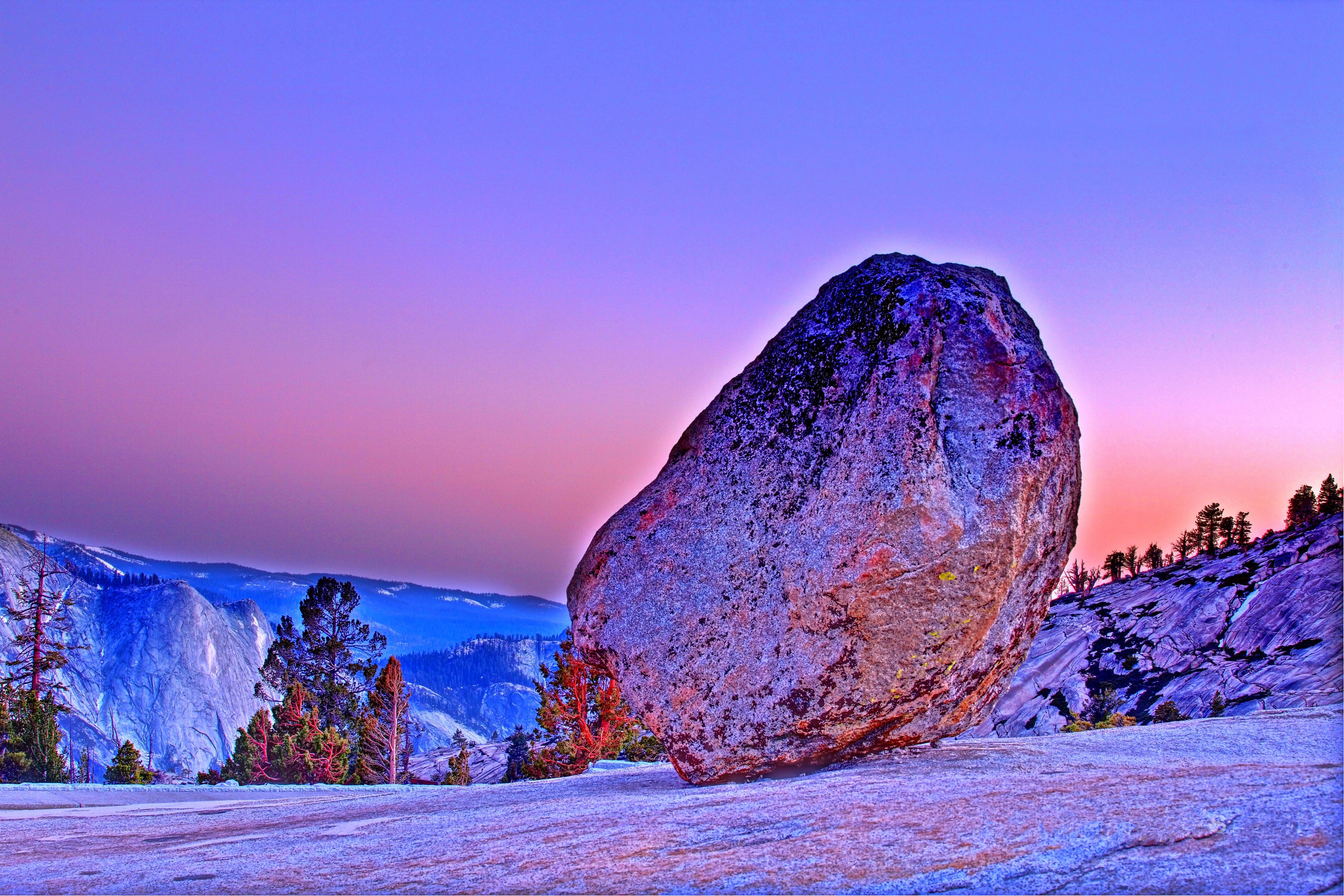 Yosemite National Park at sunset with a large boulder HD Wallpaper