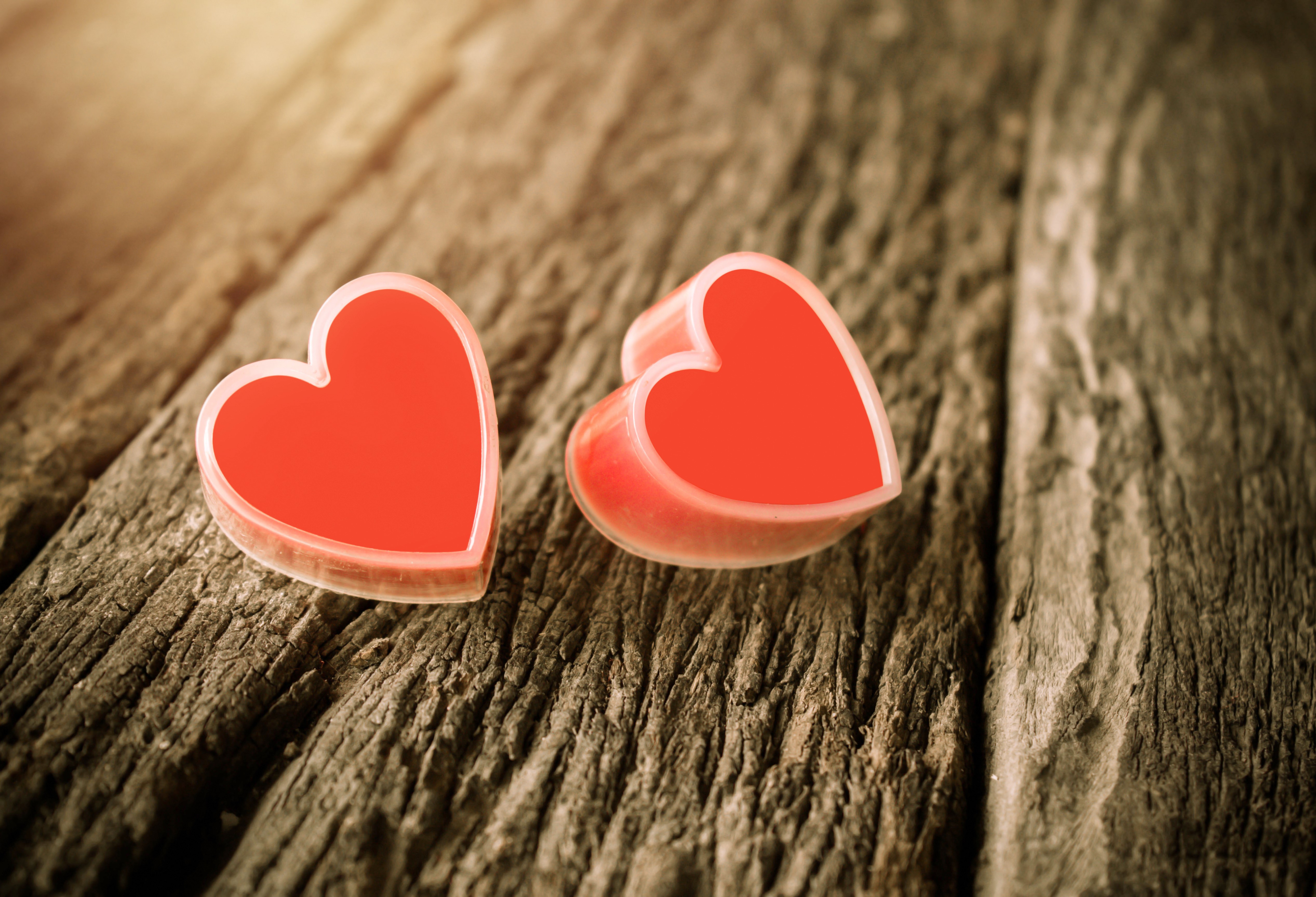 Two red hearts on wood planks HD Wallpaper