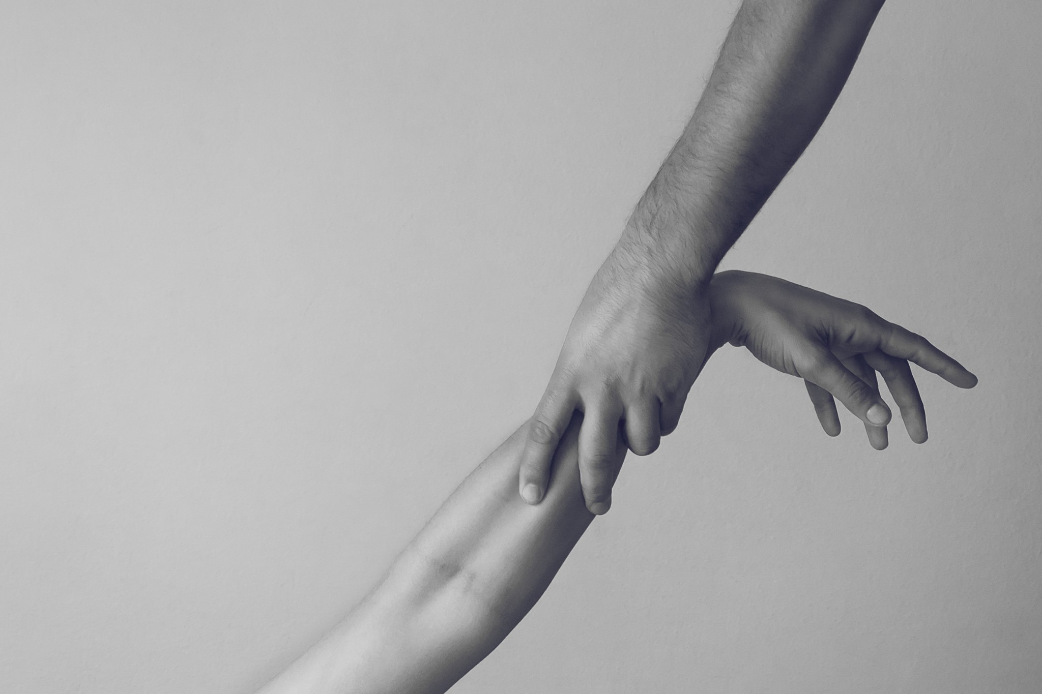 Two hands touching each other HD Wallpaper
