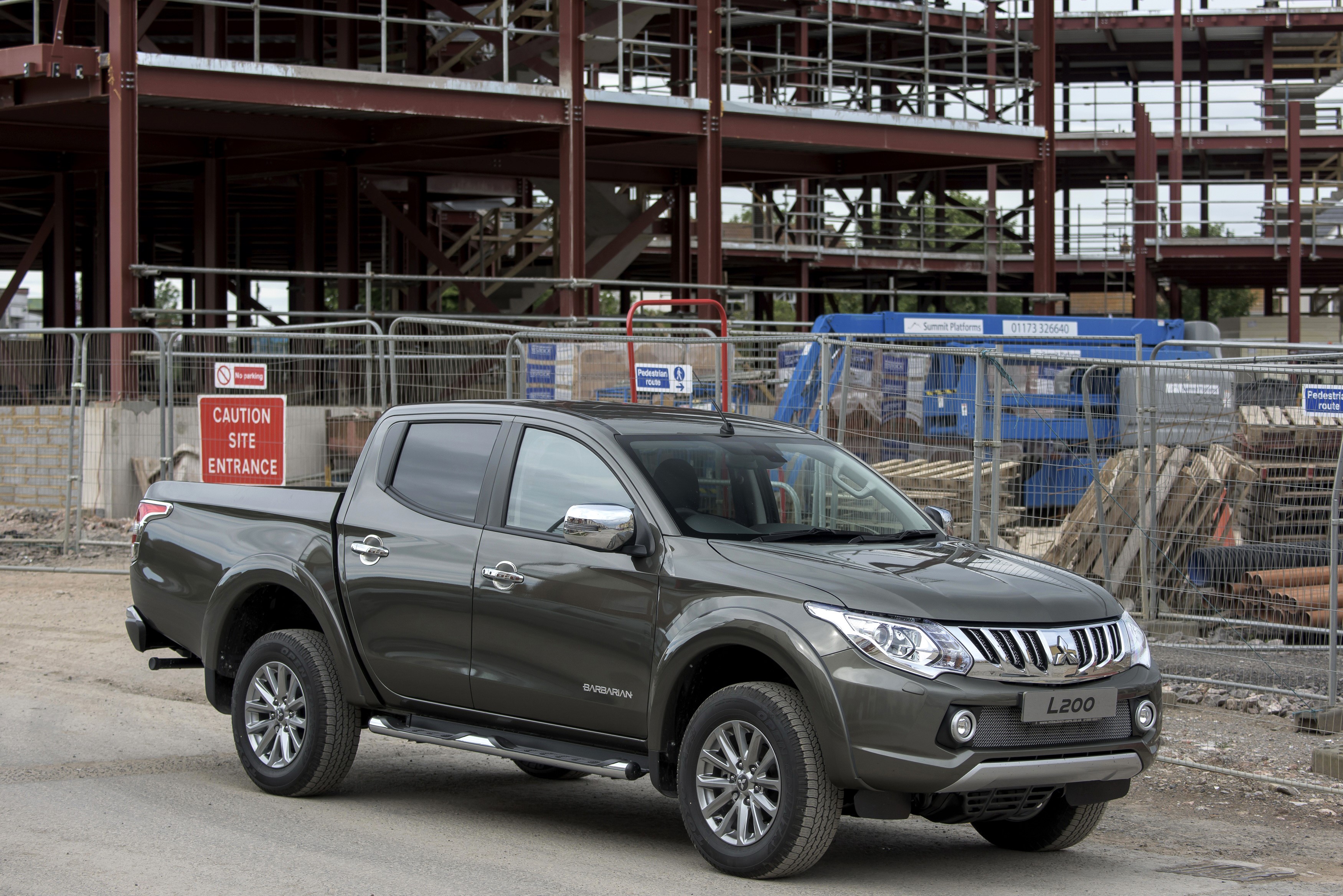 Mitsubishi L200 Barbarian pickup truck at construction site HD Wallpaper