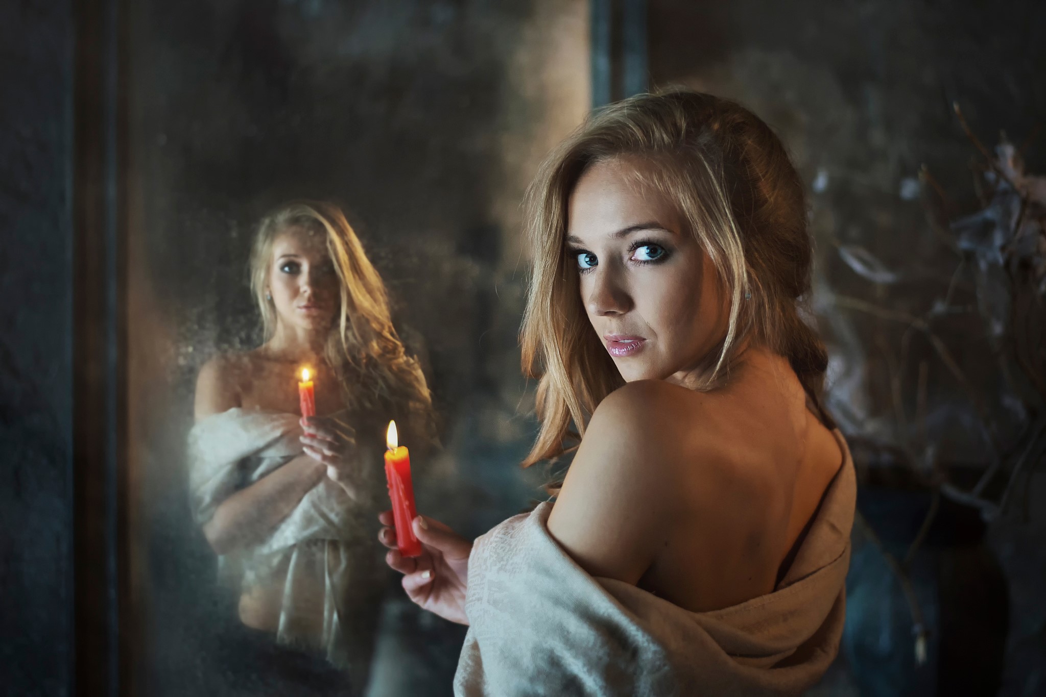 Woman with candle in front of a mirror HD Wallpaper
