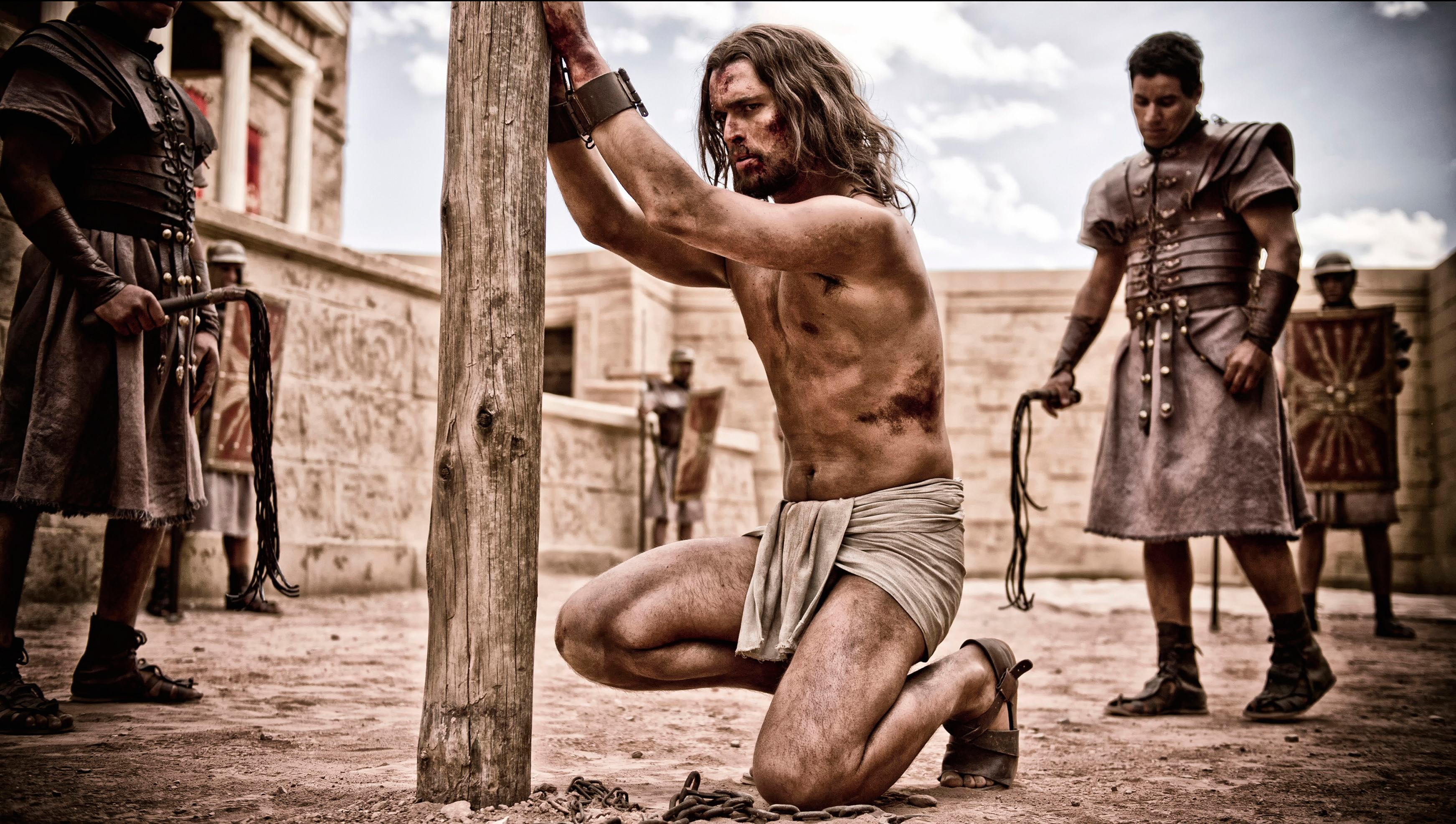 Jesus being whipped by Roman soldiers HD Wallpaper