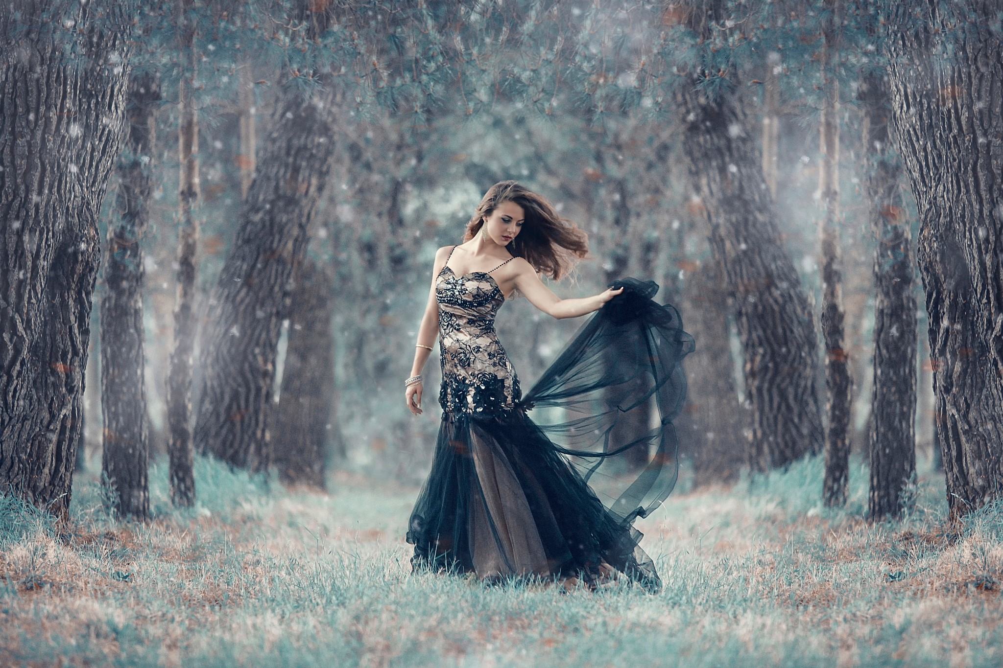 Woman in black dress in a cold forest HD Wallpaper