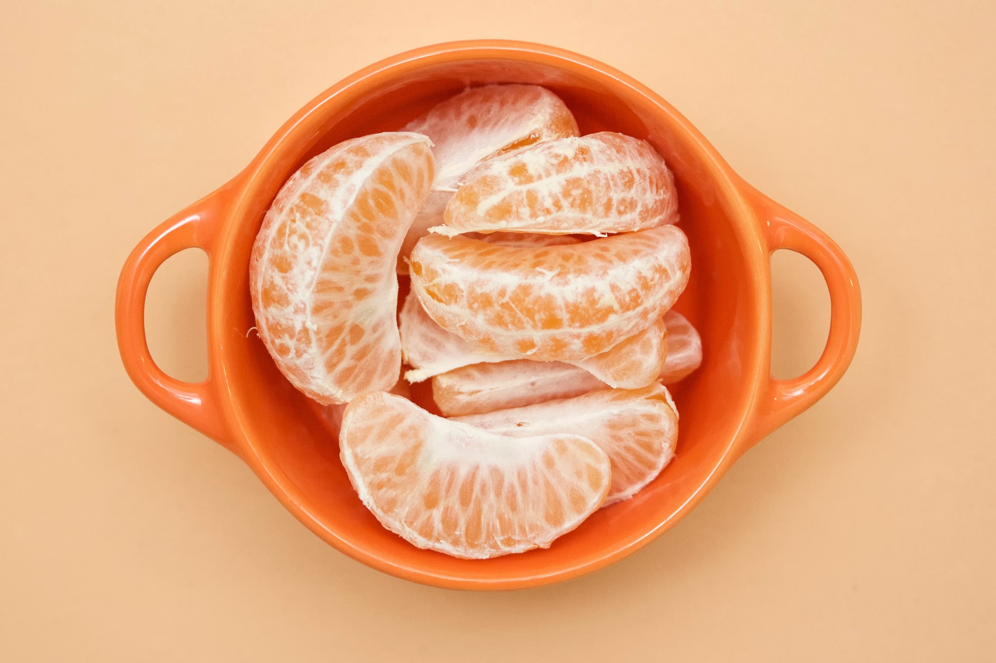 Peeled Mandarin Orange Segments in Orange Bowl HD Wallpaper