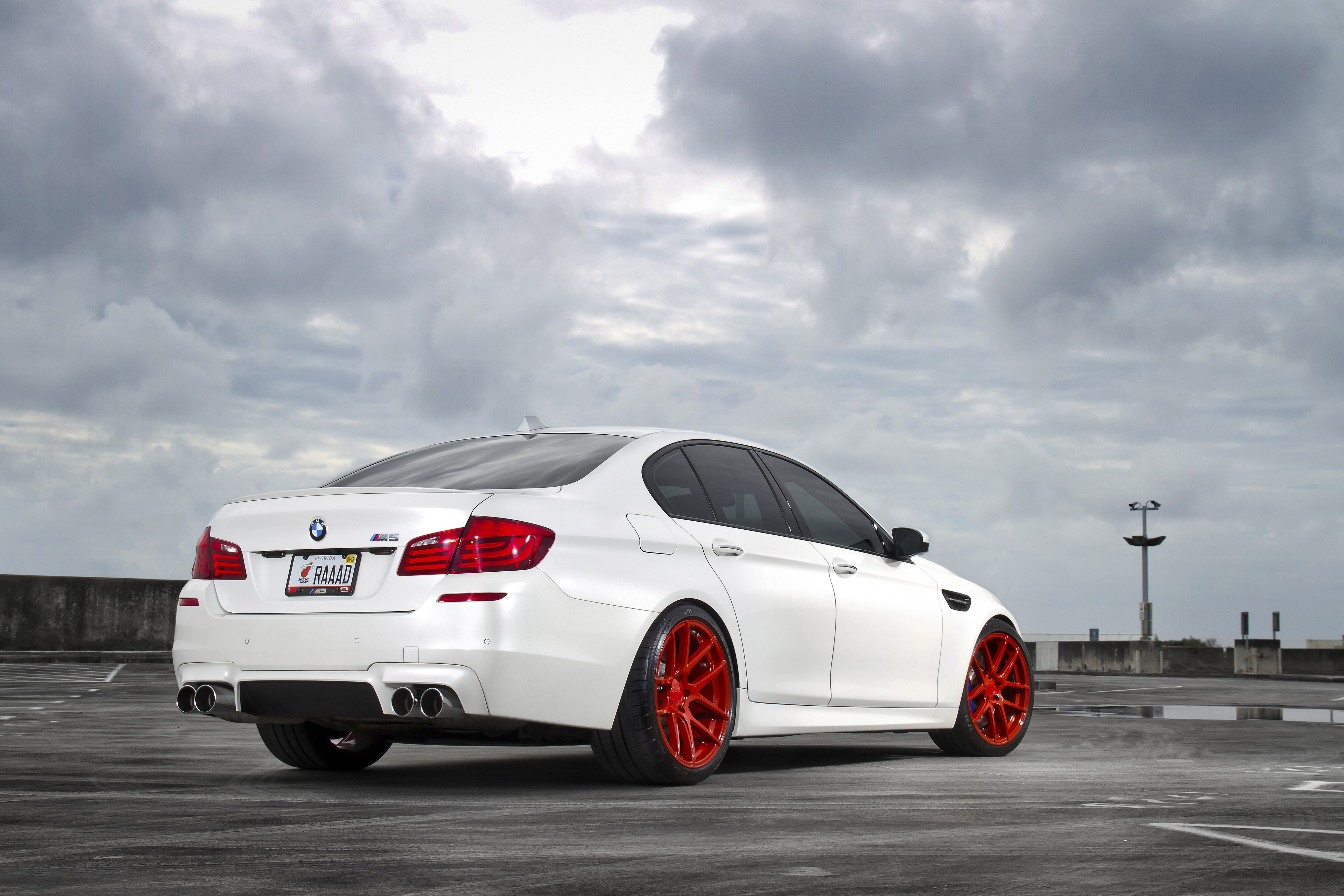 White BMW M5 F10 with Red Wheels HD Wallpaper