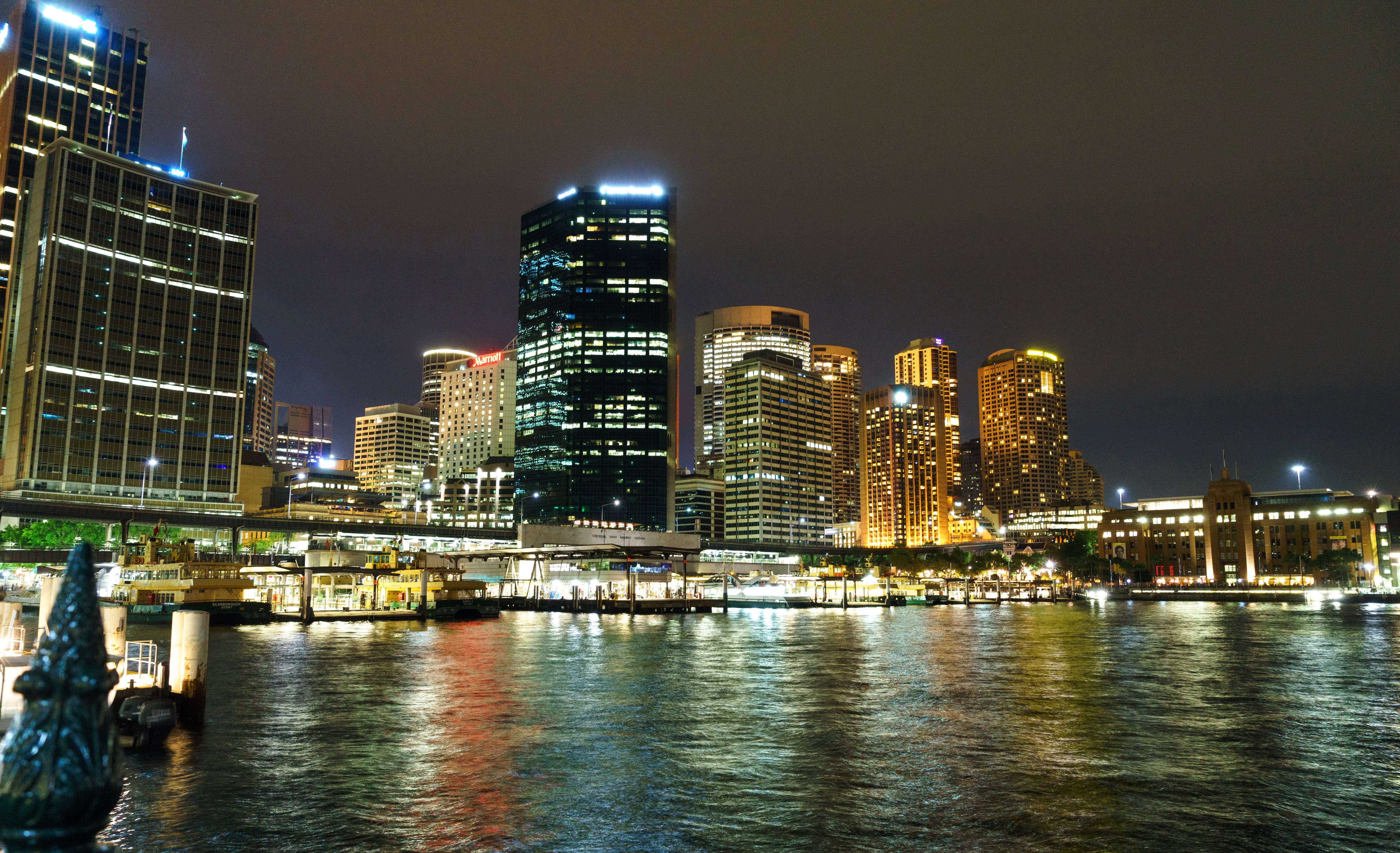 Sydney skyline at night with harbor HD Wallpaper