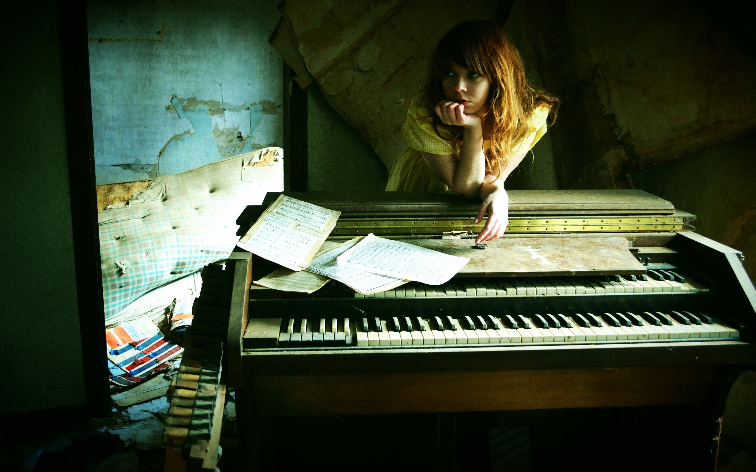 Woman leaning on an old piano with sheet music HD Wallpaper