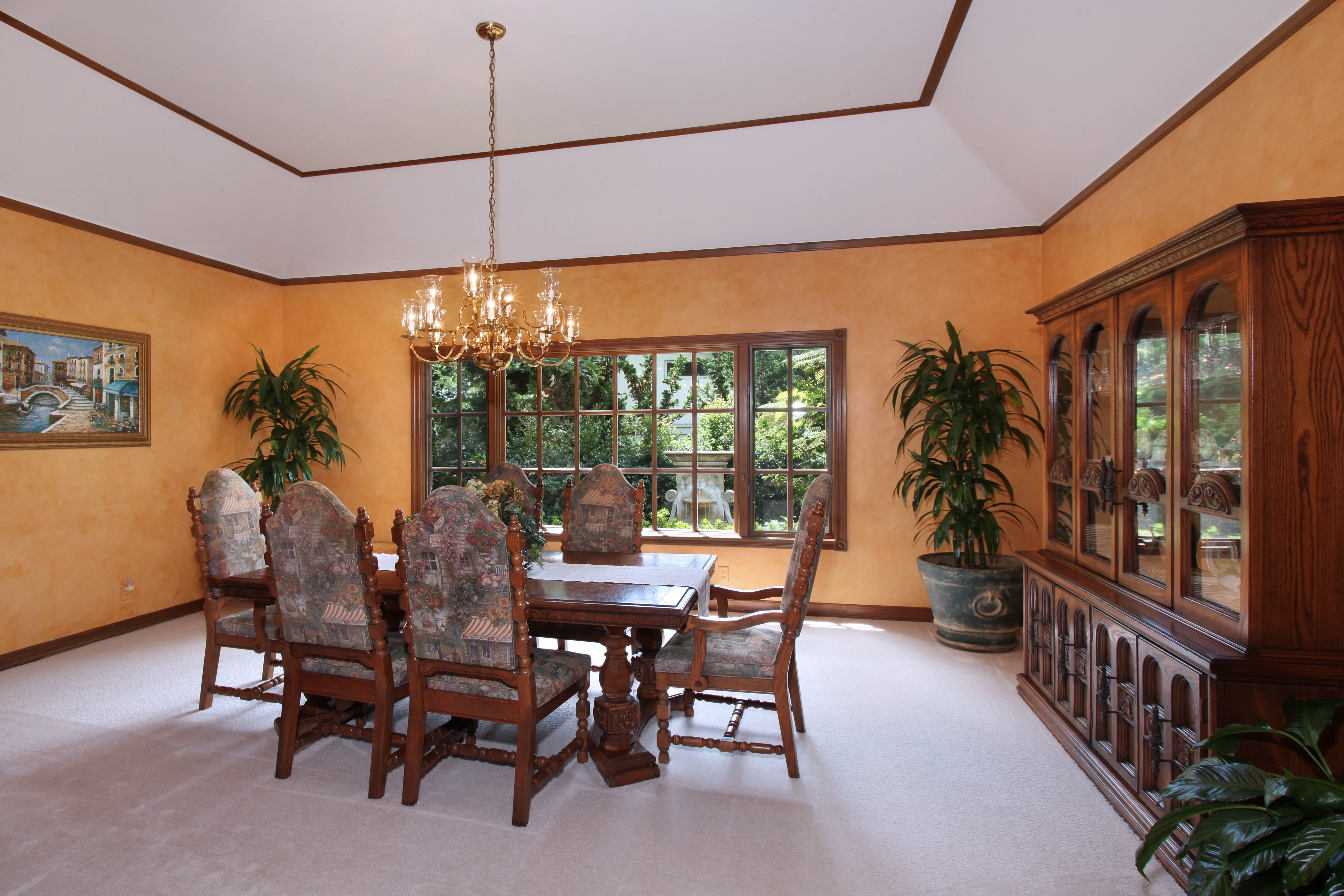 Dining room with table, chairs, chandelier, and hutch HD Wallpaper
