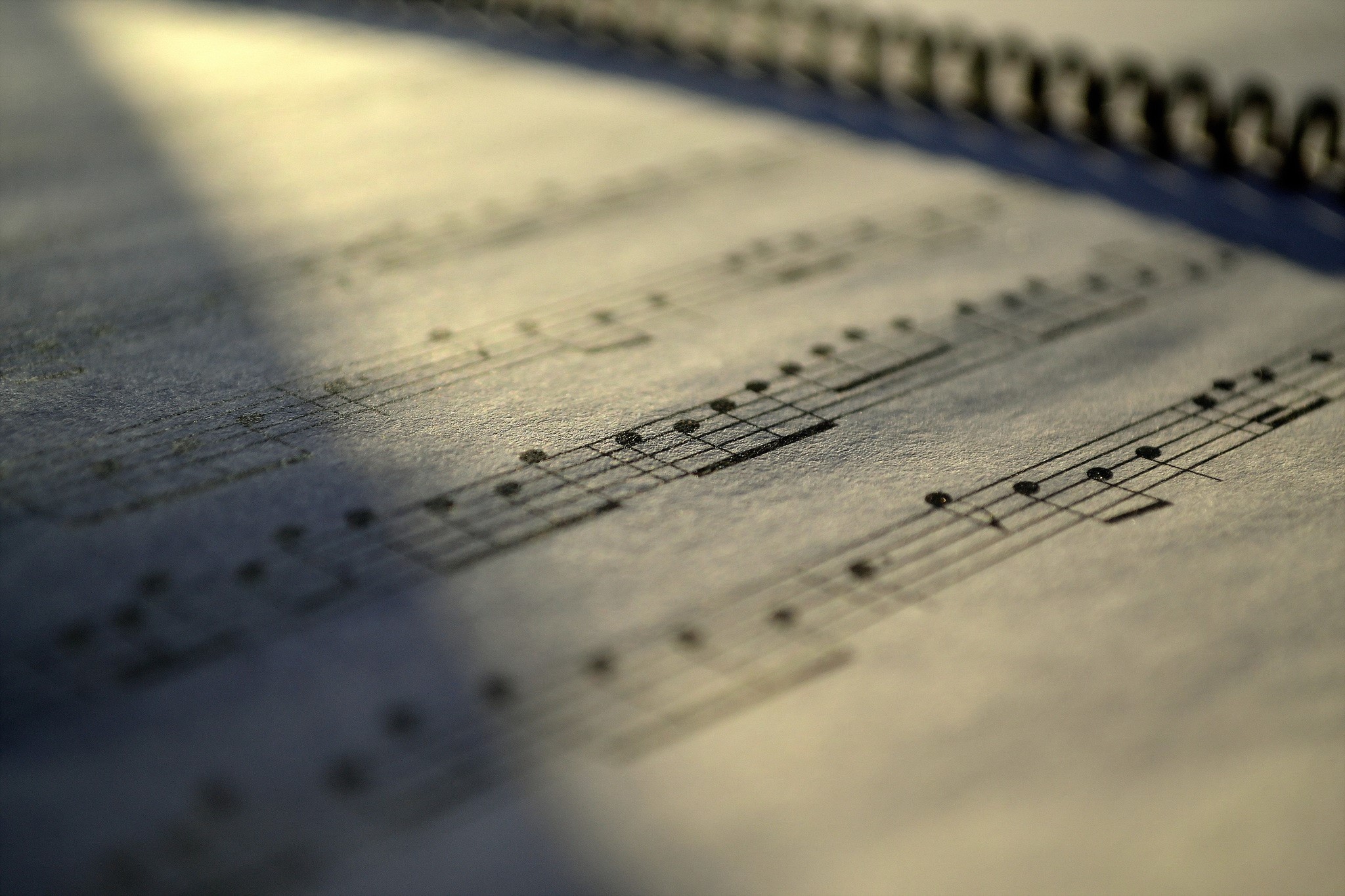 Sheet music with musical notes and staff lines HD Wallpaper