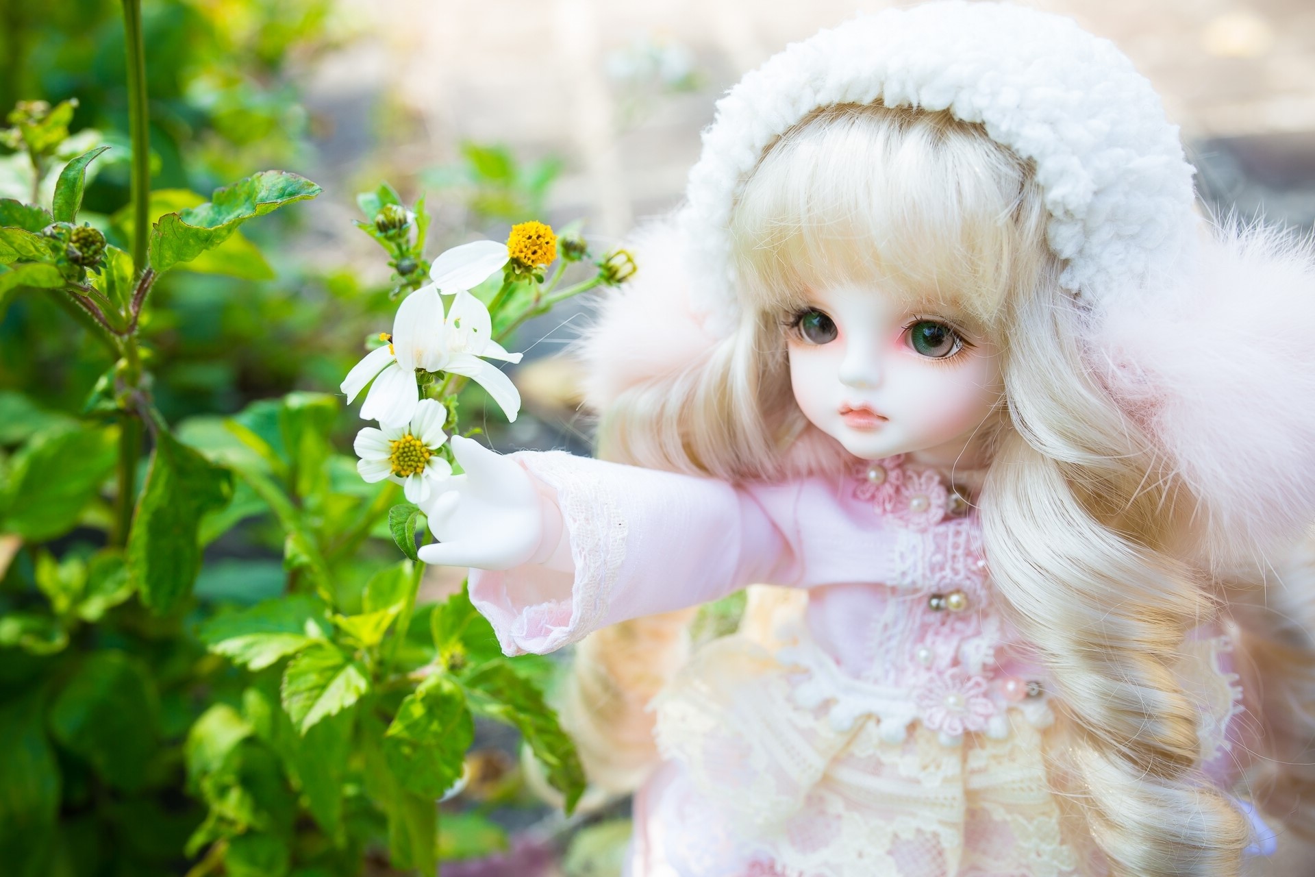 Doll with blonde hair wearing a pink outfit and white hood HD Wallpaper