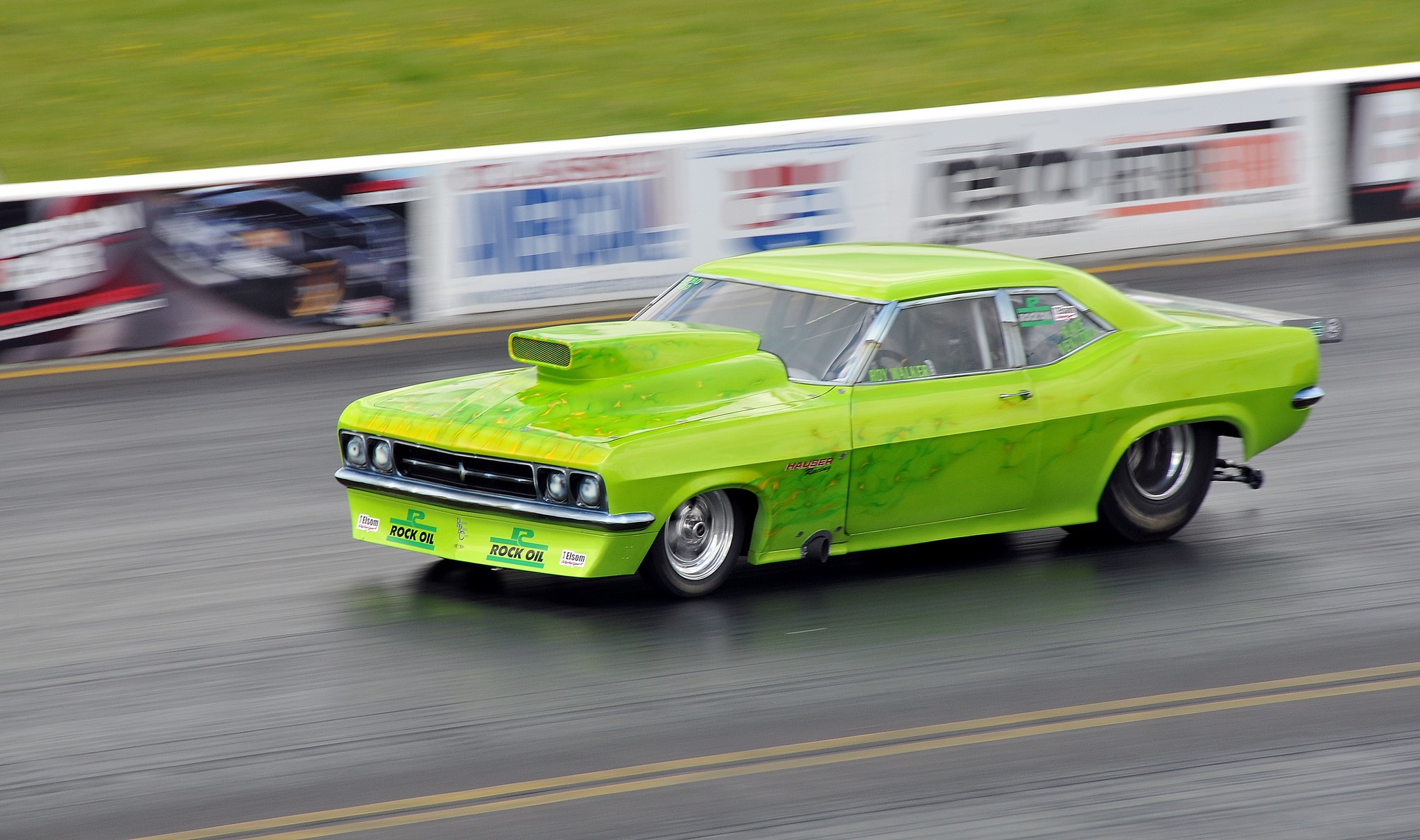 Lime green drag racing muscle car with "Rock Oil" branding HD Wallpaper