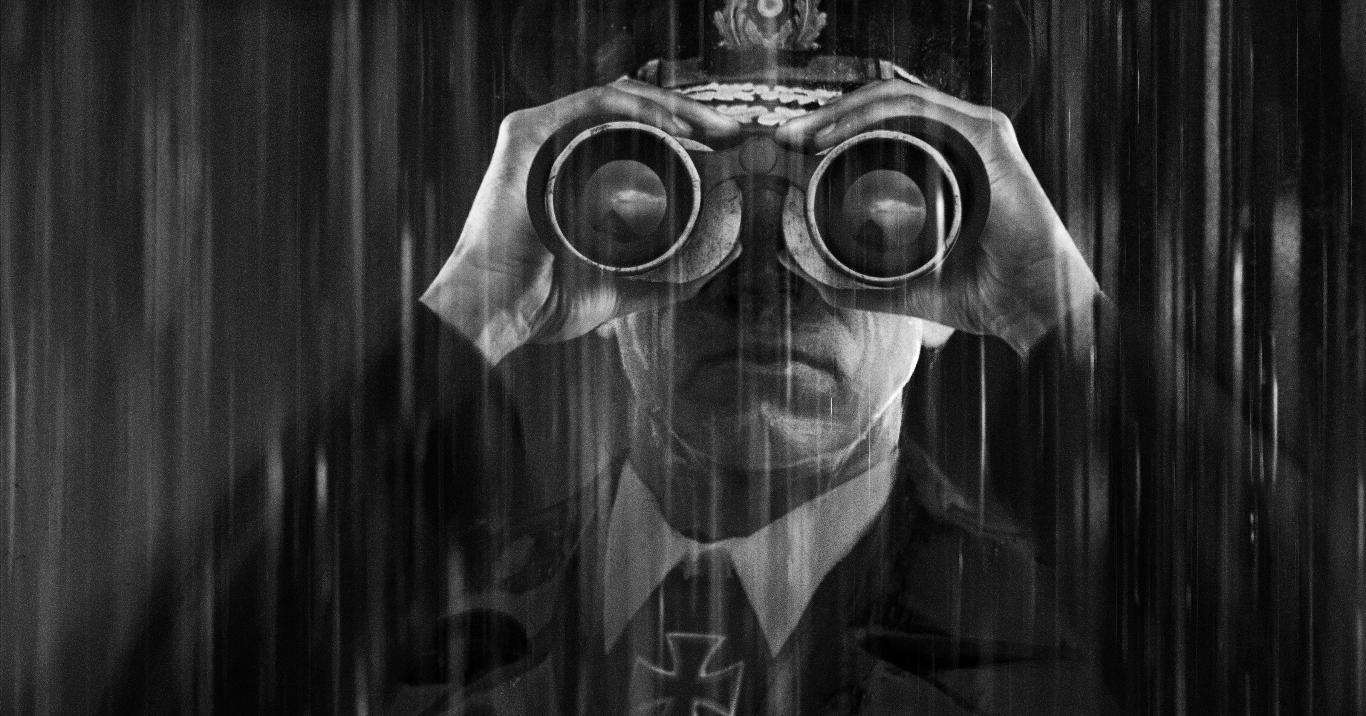 Soldier with binoculars and medal HD Wallpaper