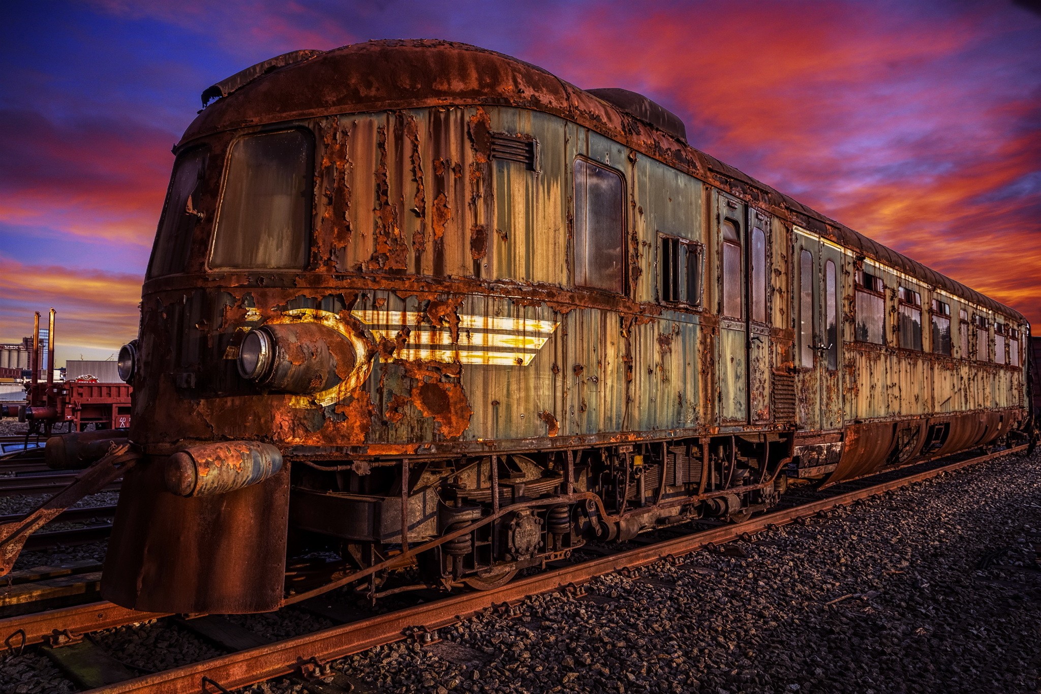 Abandoned rusty train locomotive at sunset HD Wallpaper
