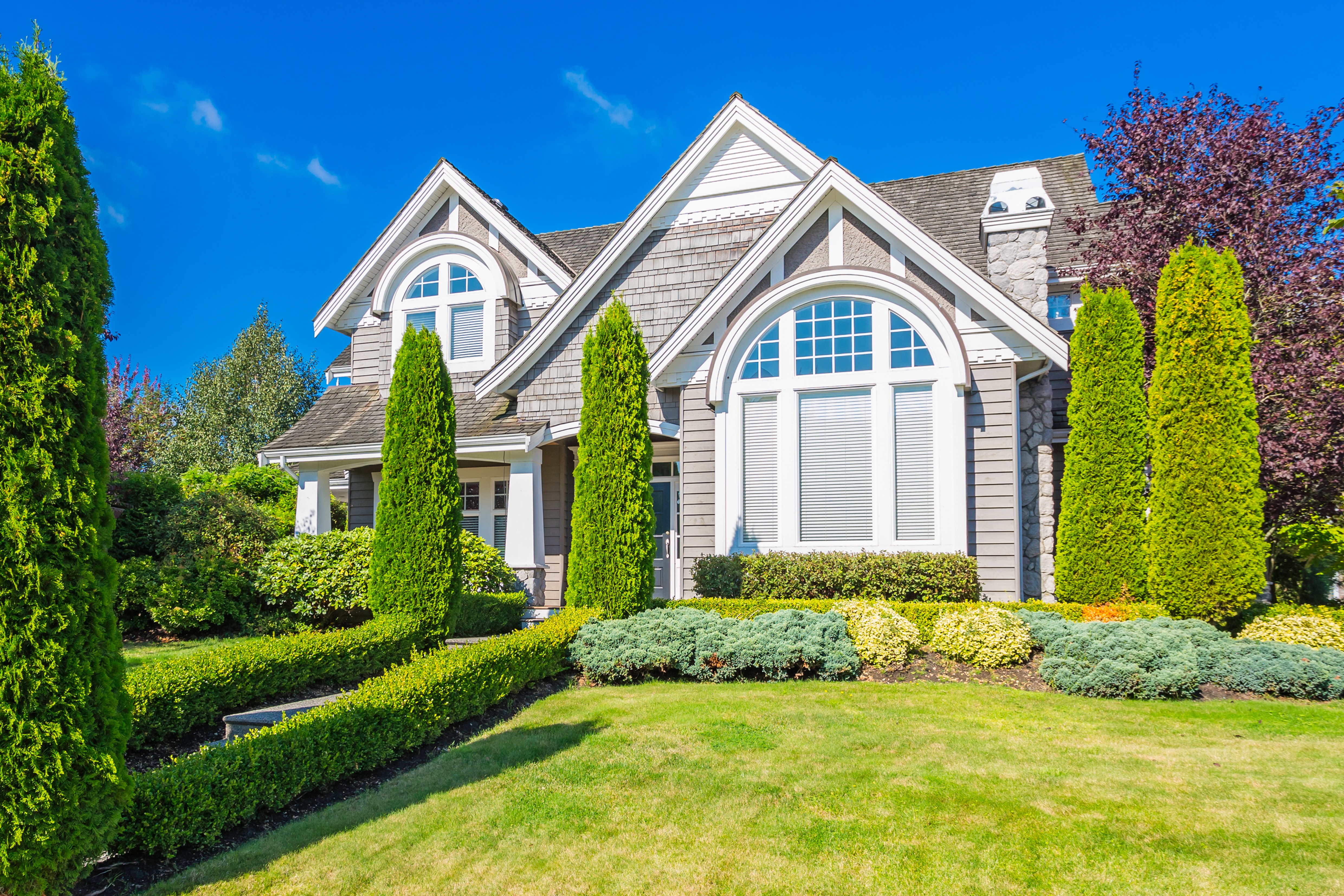 Luxury House with Landscaped Lawn and Trees HD Wallpaper
