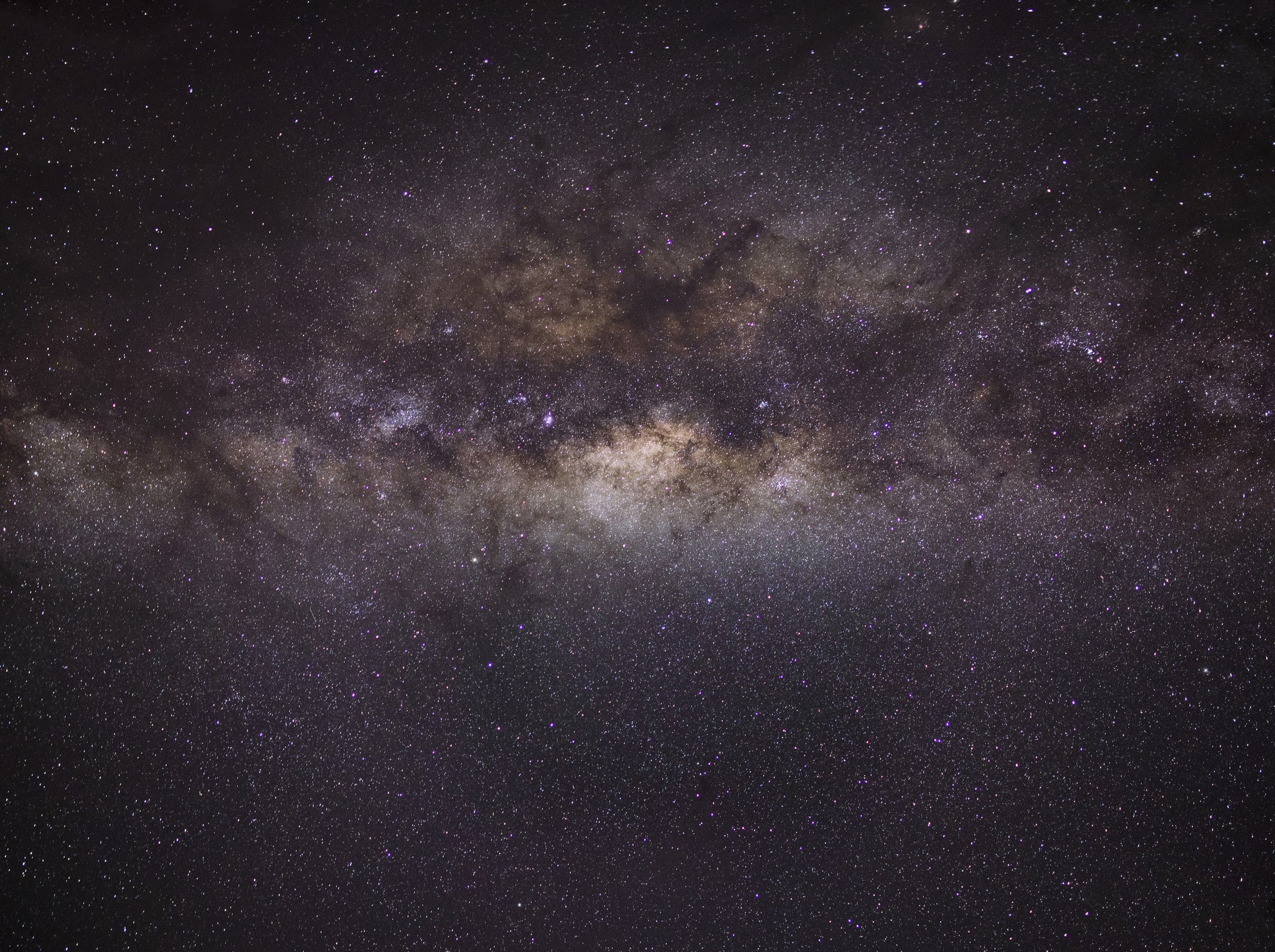 The Milky Way galaxy and stars in the night sky HD Wallpaper