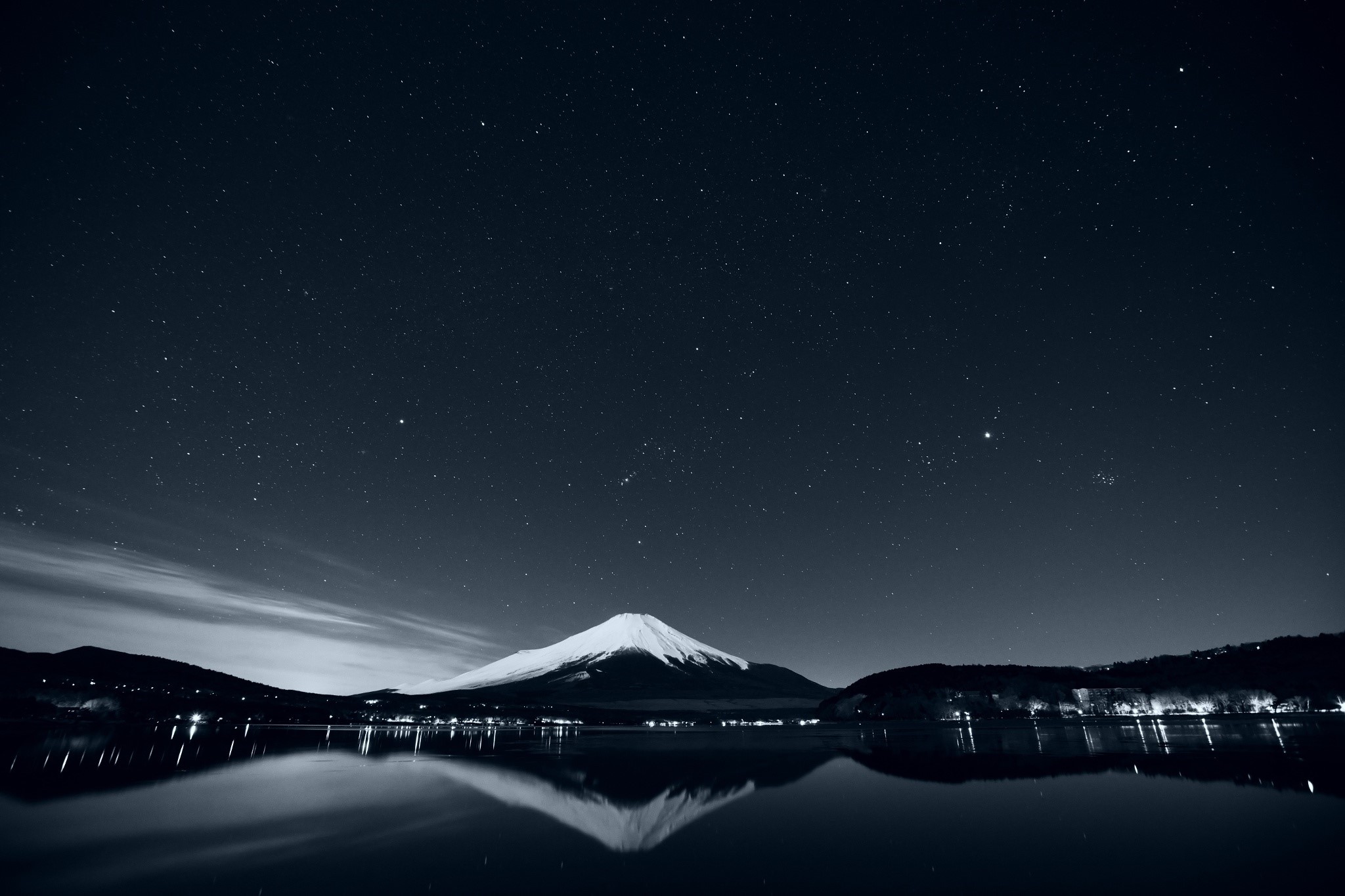 Mount Fuji reflected in a lake at night under a starry sky HD Wallpaper