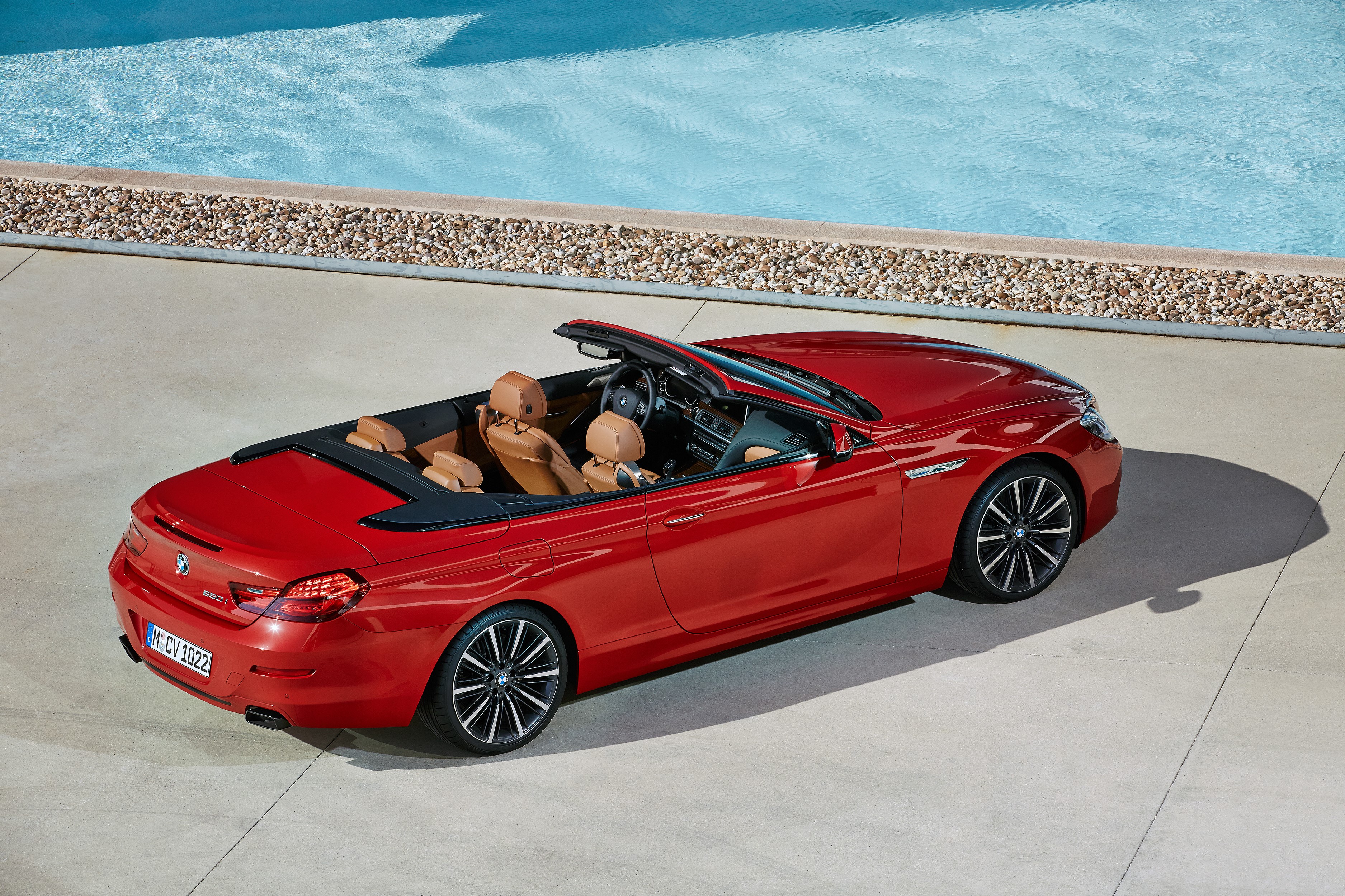 Red BMW M6 Convertible by a Pool HD Wallpaper