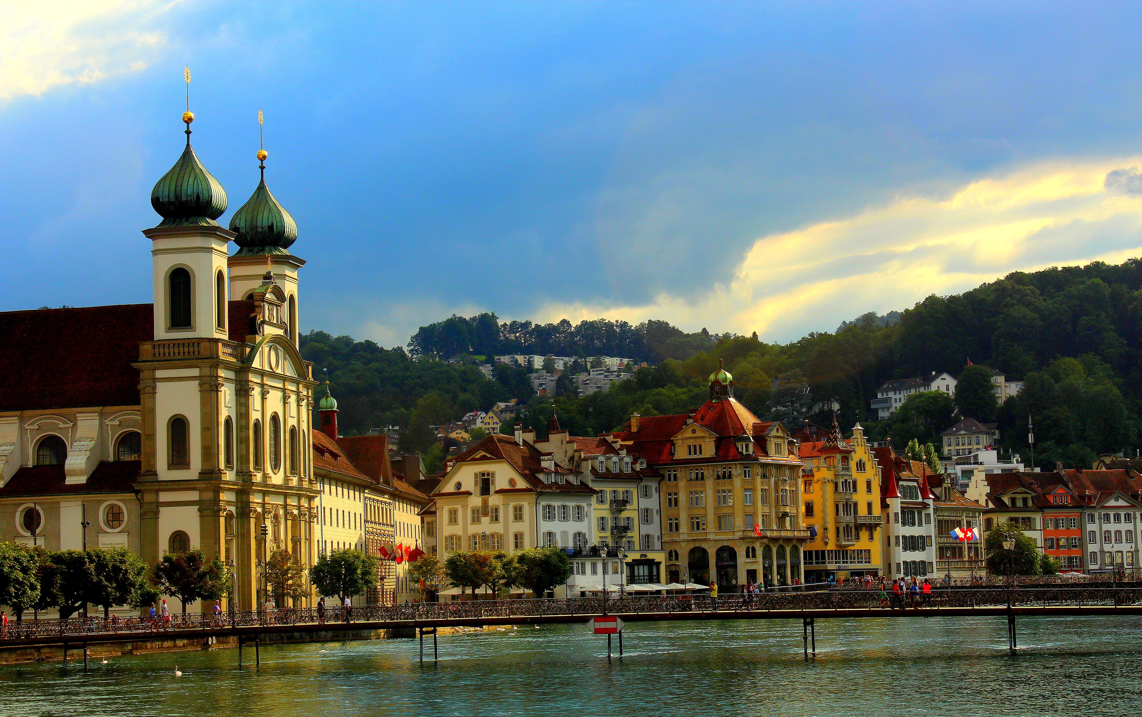 Lucerne, Switzerland Riverfront with Church and Buildings HD Wallpaper