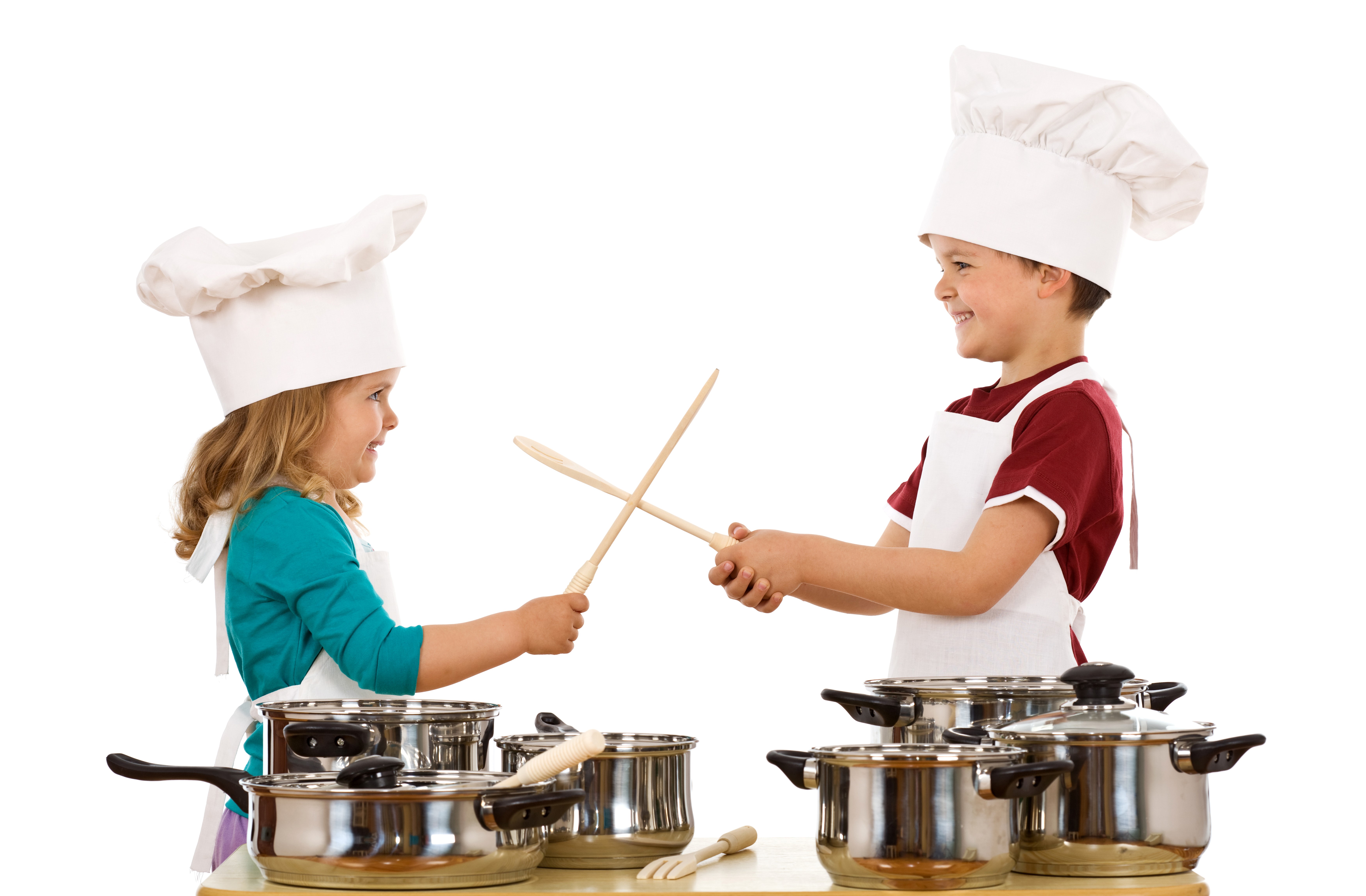 Two children in chef hats playing with wooden spoons HD Wallpaper