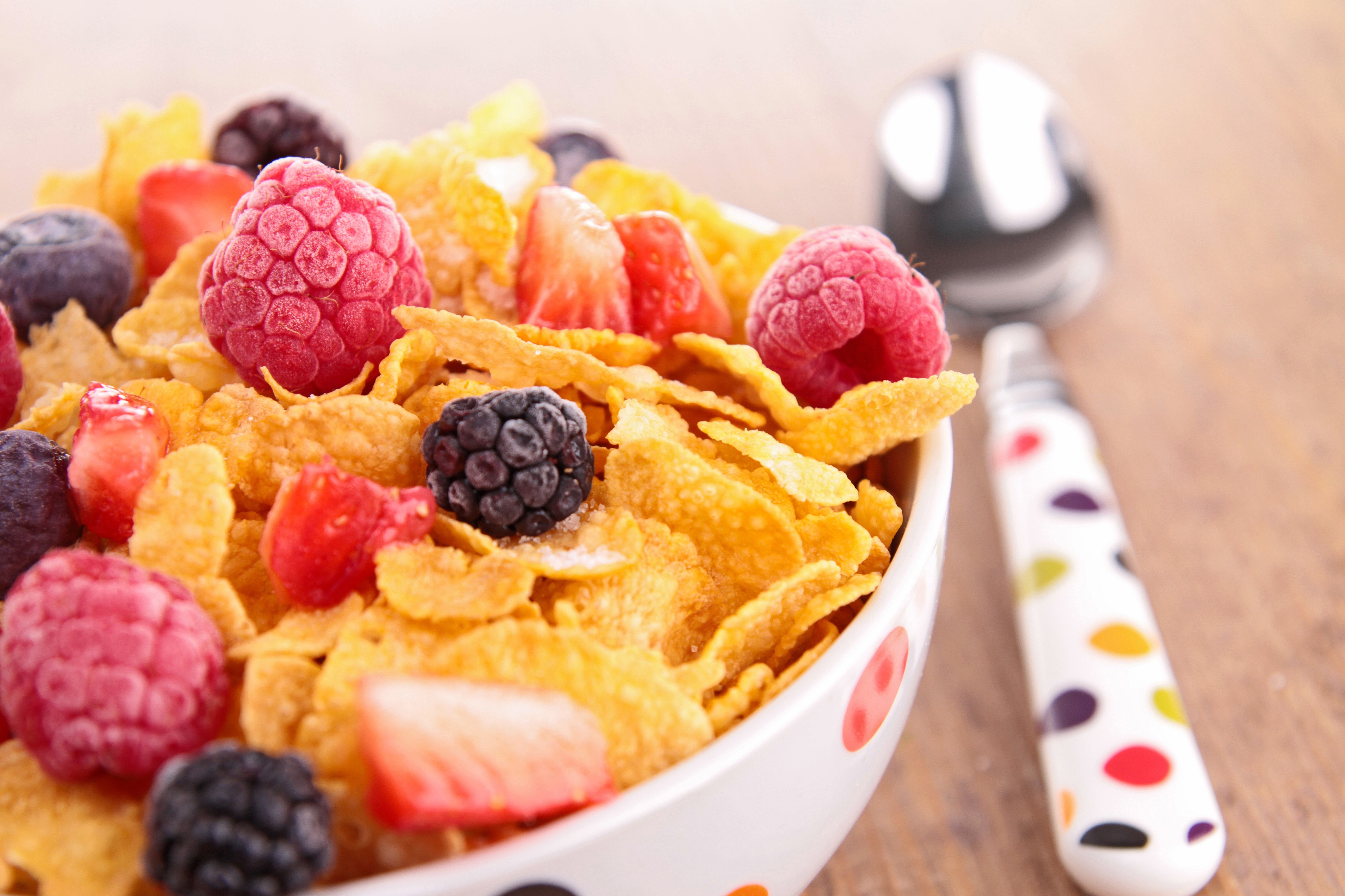Bowl of Corn Flakes with Berries and Spoon HD Wallpaper