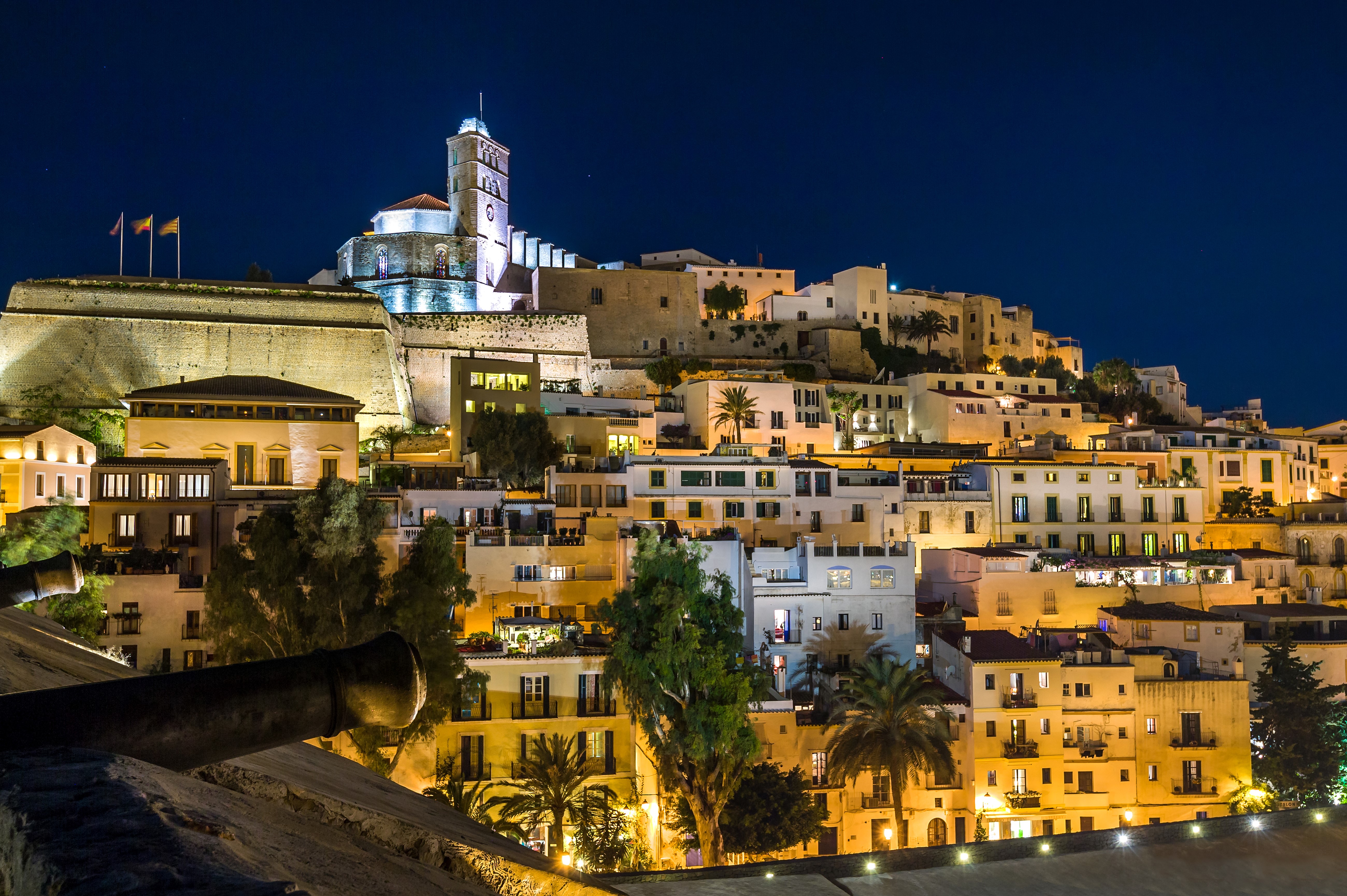 Ibiza old town at night with cannons HD Wallpaper