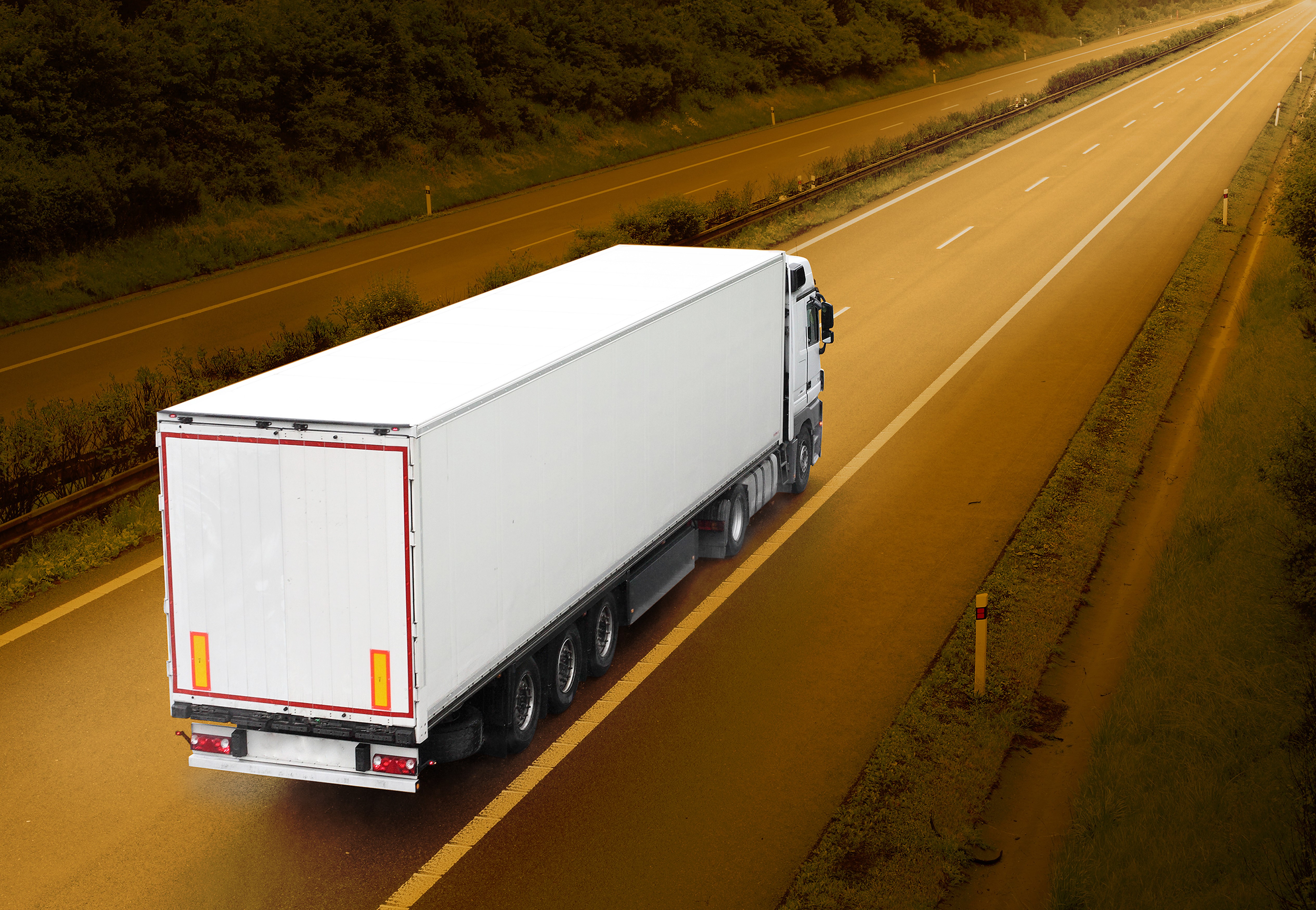 White semi-trailer truck on a highway HD Wallpaper
