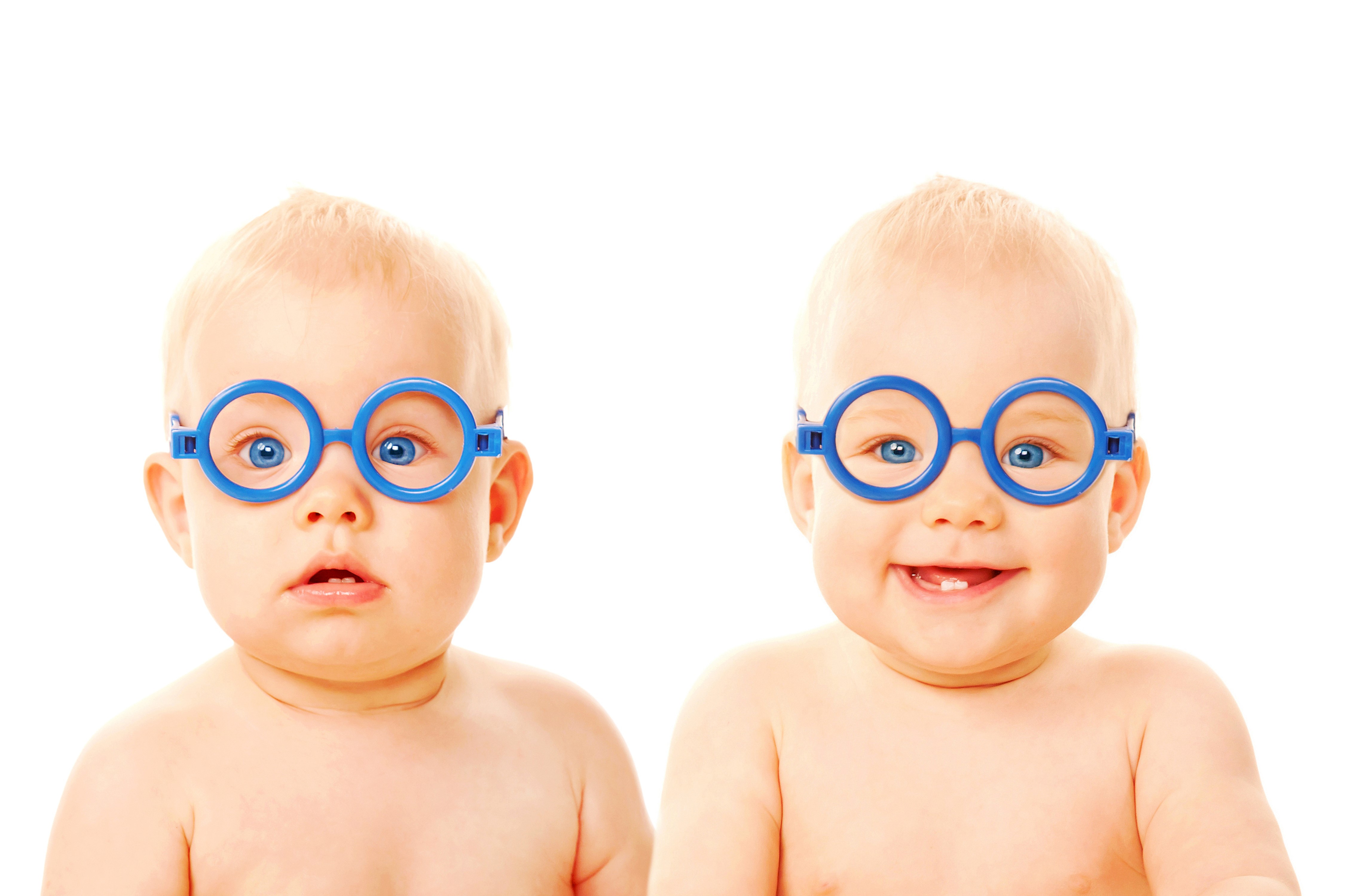 Two infants wearing blue glasses HD Wallpaper