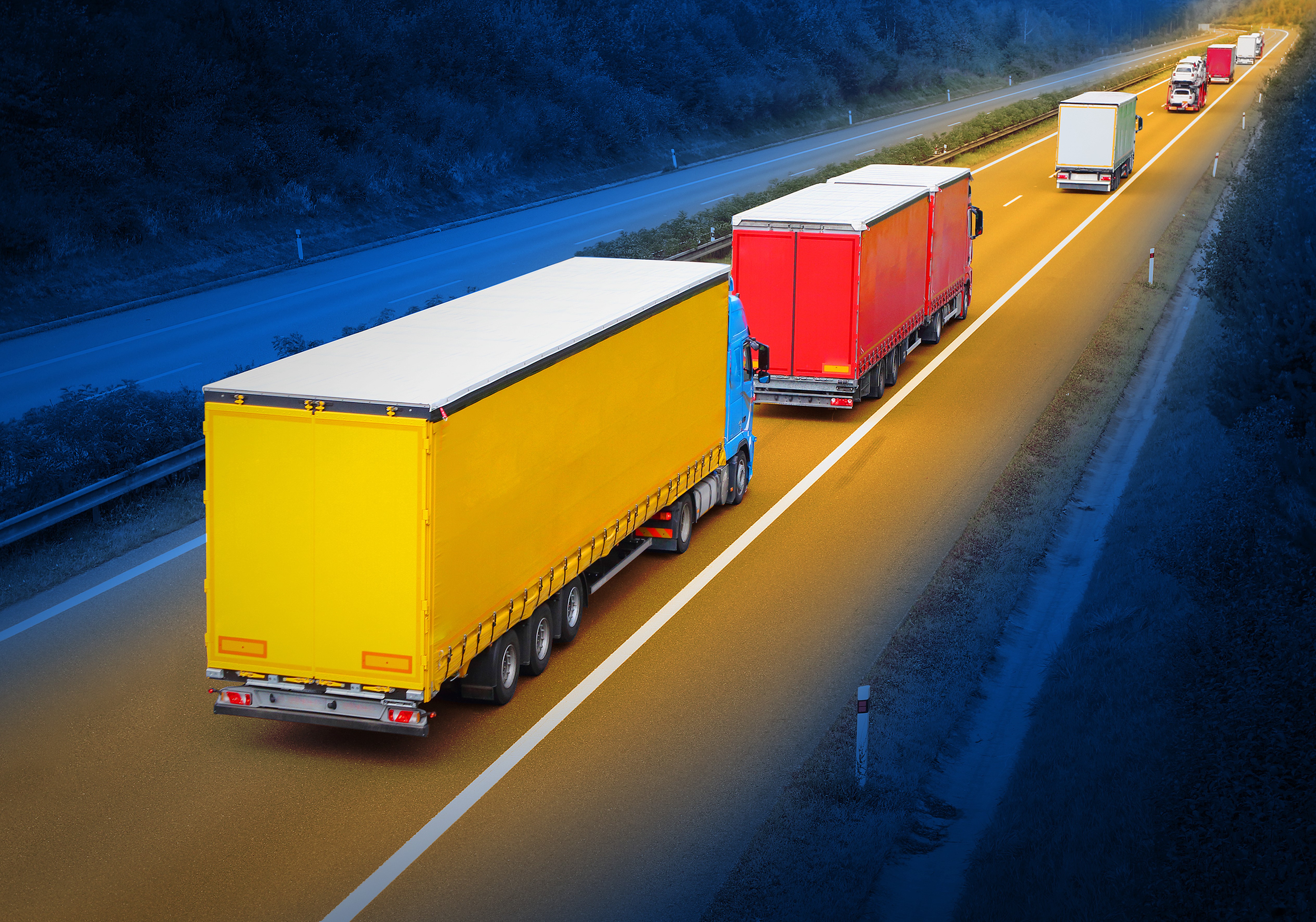Trucks on a highway HD Wallpaper