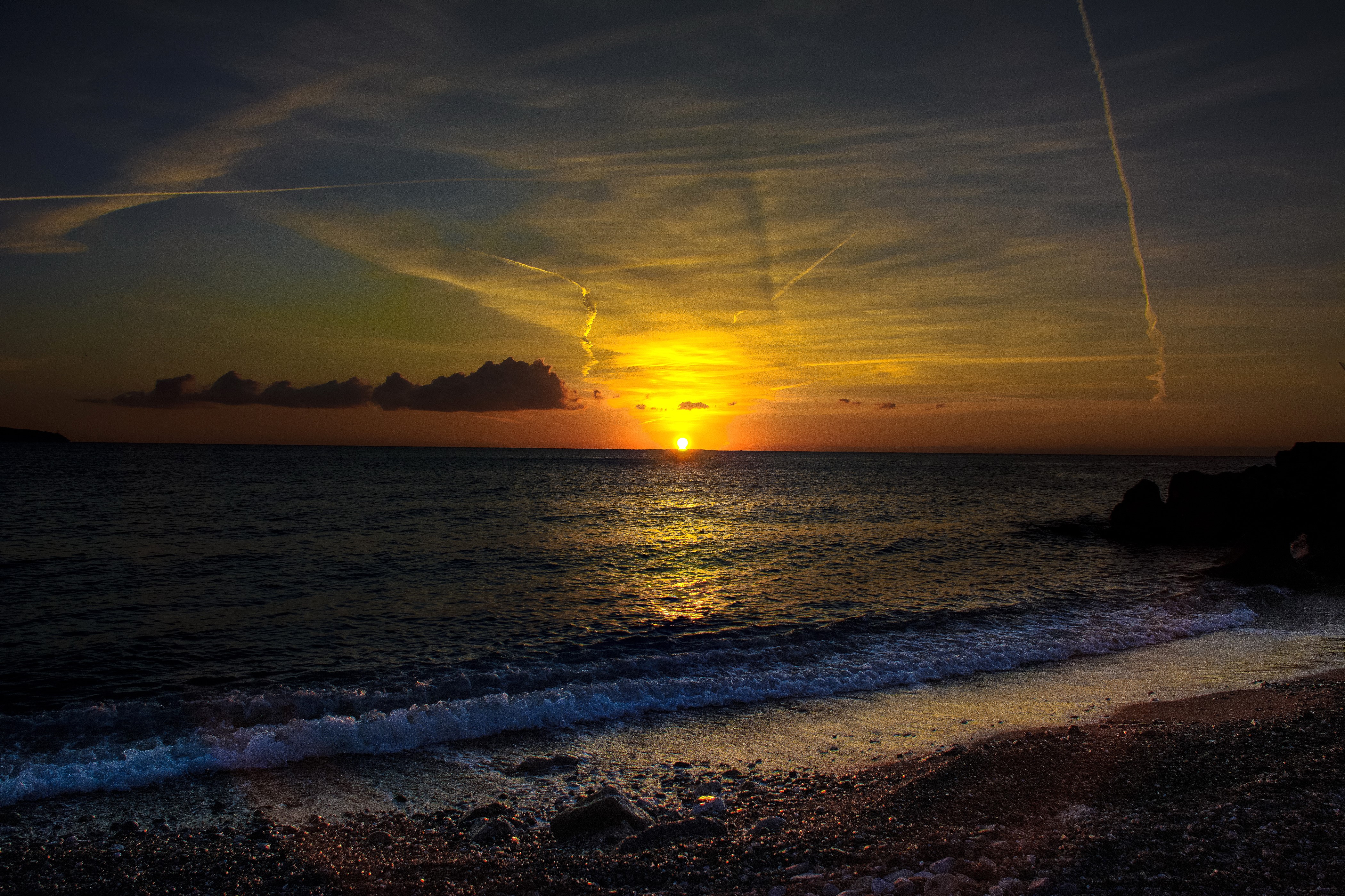 Sunset over the sea coast in France HD Wallpaper
