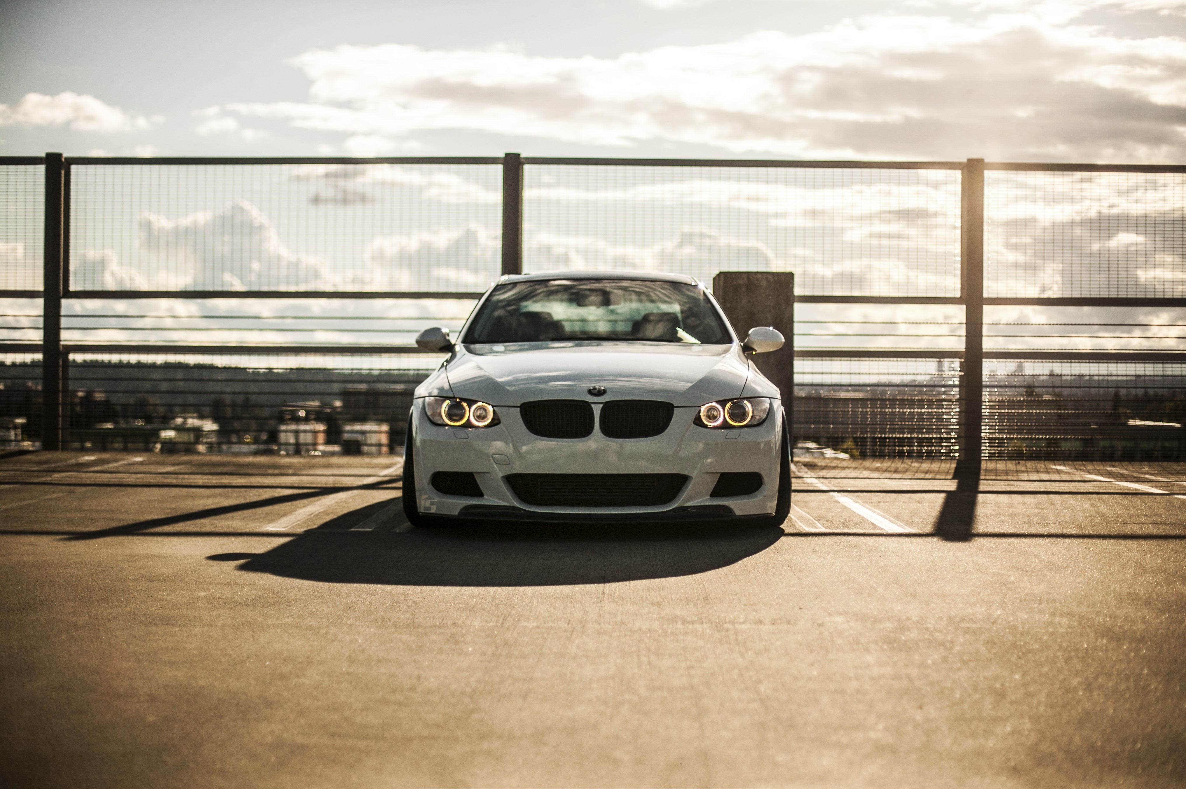 White BMW M3 E92 parked on rooftop HD Wallpaper